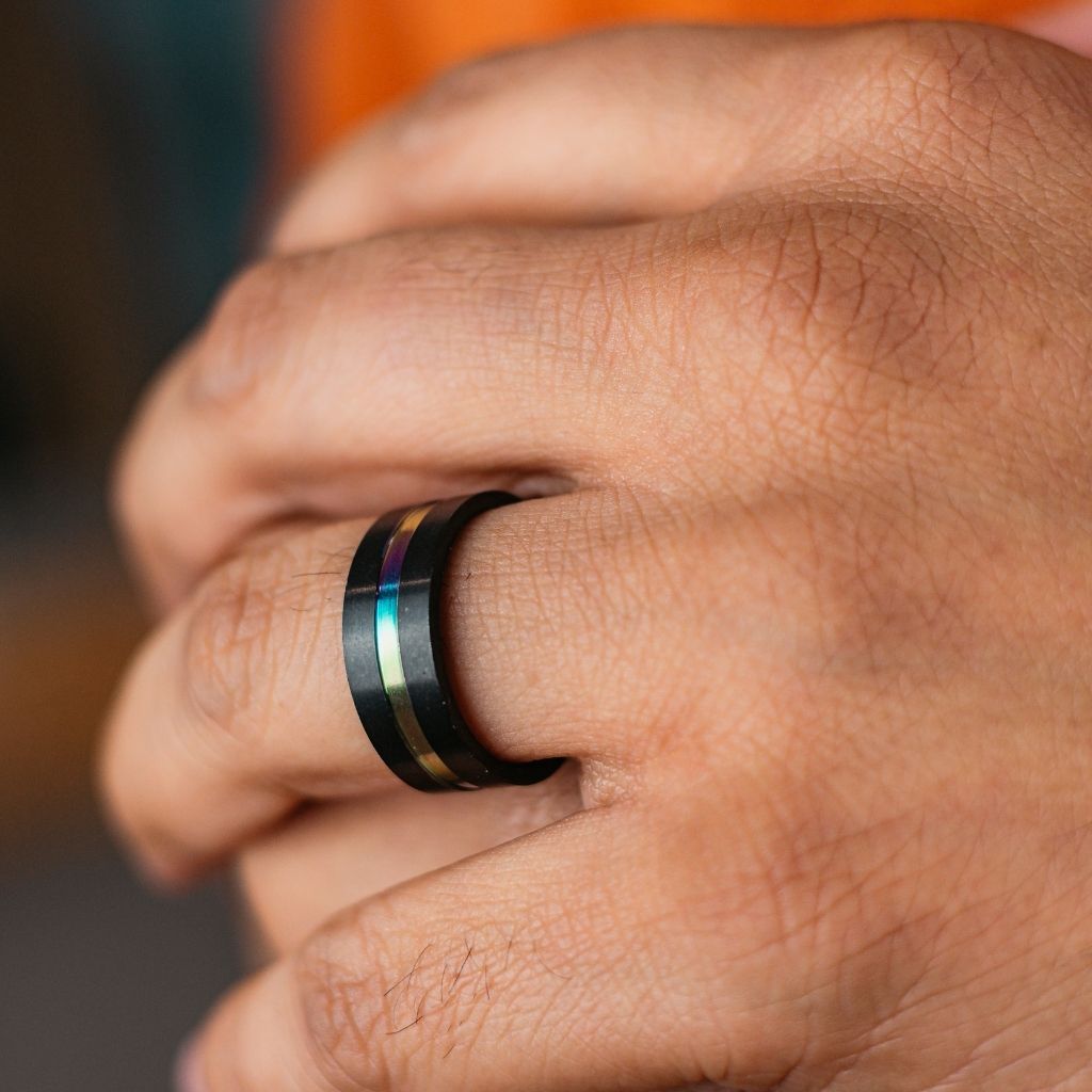 8mm Stainless Steel Unicorn Rainbow Unisex Thumb Band Ring showcasing a silver finish with colorful unicorn hues, perfect for both men and women.