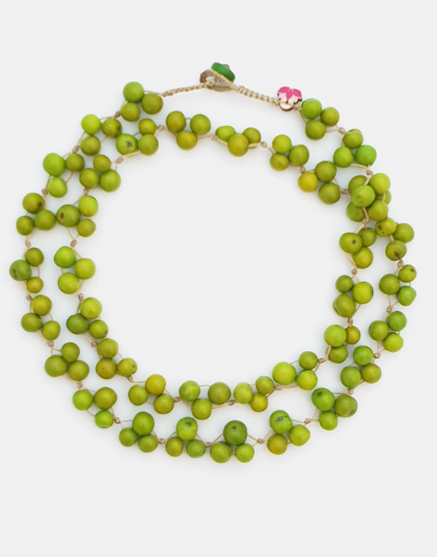 A vibrant Acai Berry Long Necklace made from colorful acai seeds, showcasing its lightweight and handmade design.