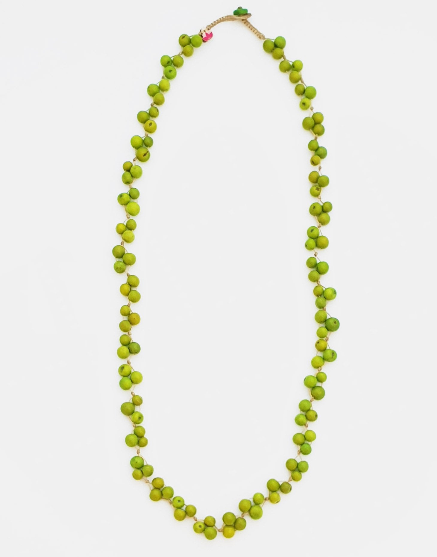 A vibrant Acai Berry Long Necklace made from colorful acai seeds, showcasing its lightweight and handmade design.