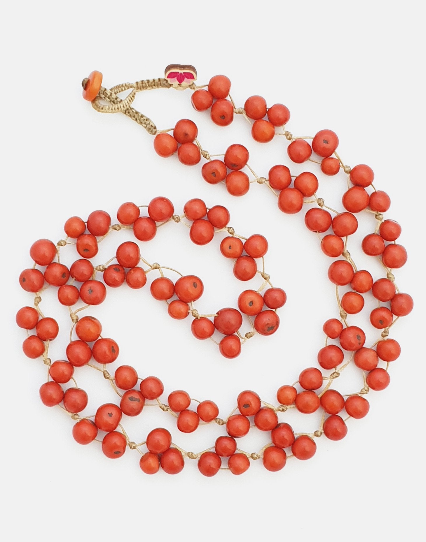 Acai Berry Long Necklace featuring warm colours, handmade with organic acai seeds, showcasing a lightweight and delicate design.