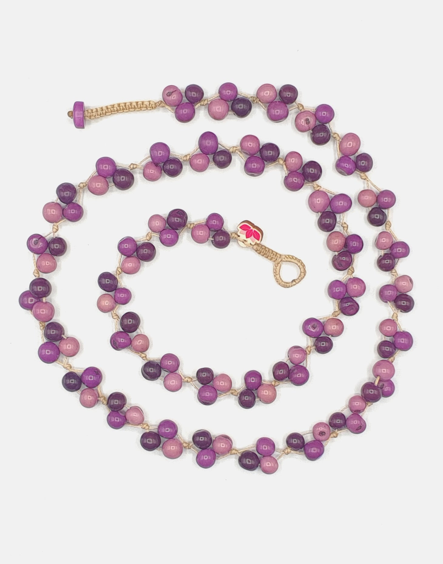 Acai Berry Long Necklace featuring warm colours, handmade with organic acai seeds, showcasing a lightweight and delicate design.