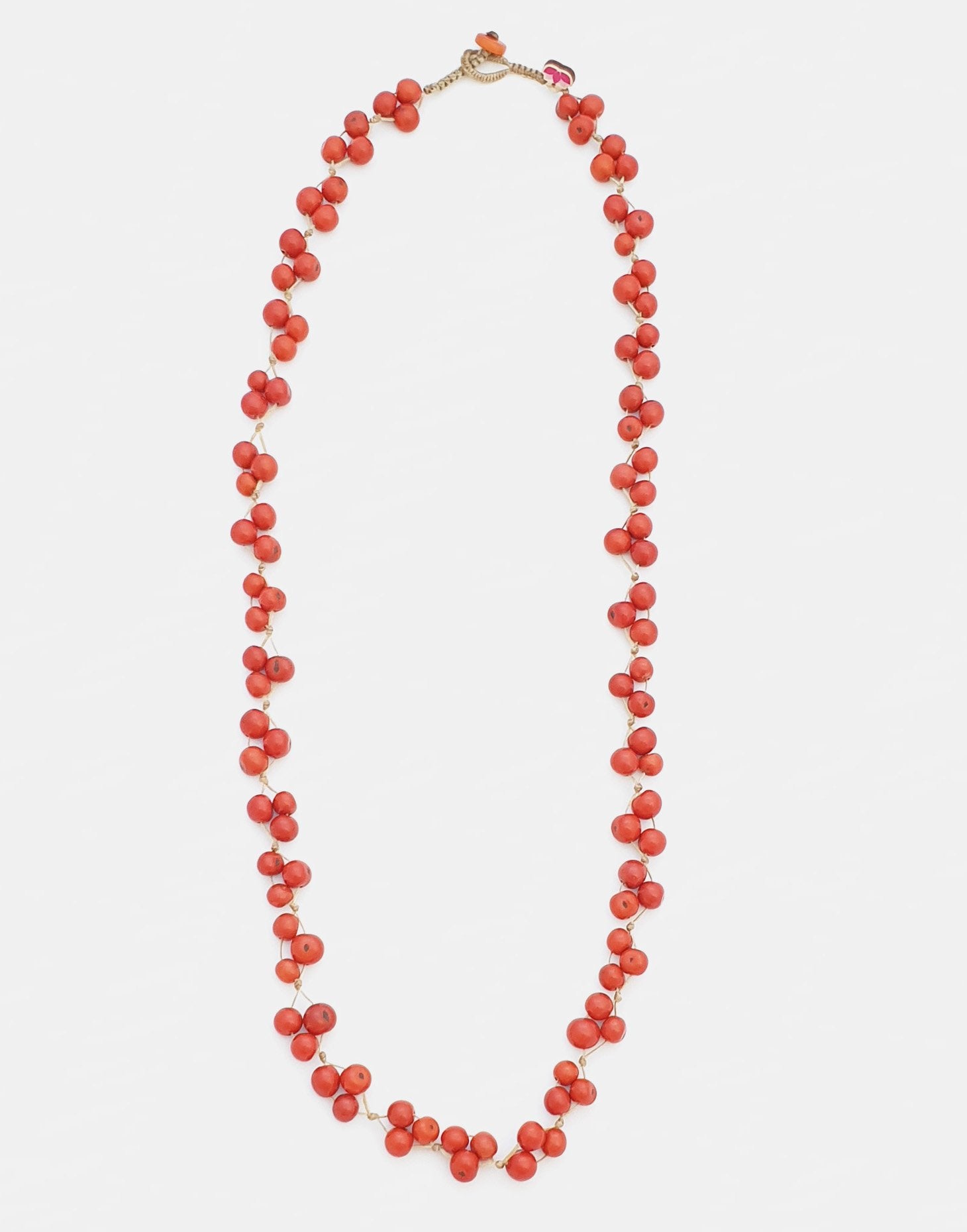 Acai Berry Long Necklace featuring warm colours, handmade with organic acai seeds, showcasing a lightweight and delicate design.