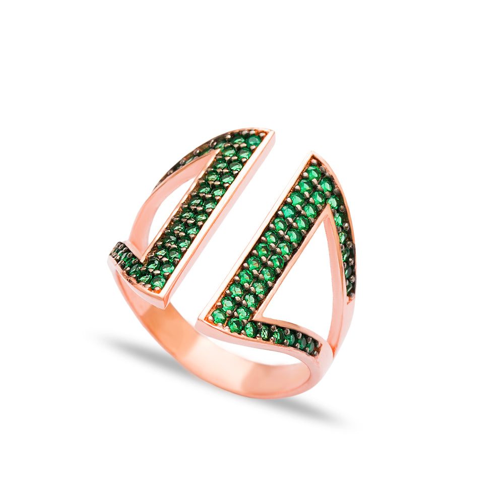 ADAH Ring featuring emerald-green cubic zirconias in a black gold finish, showcasing an elegant open cuff design.