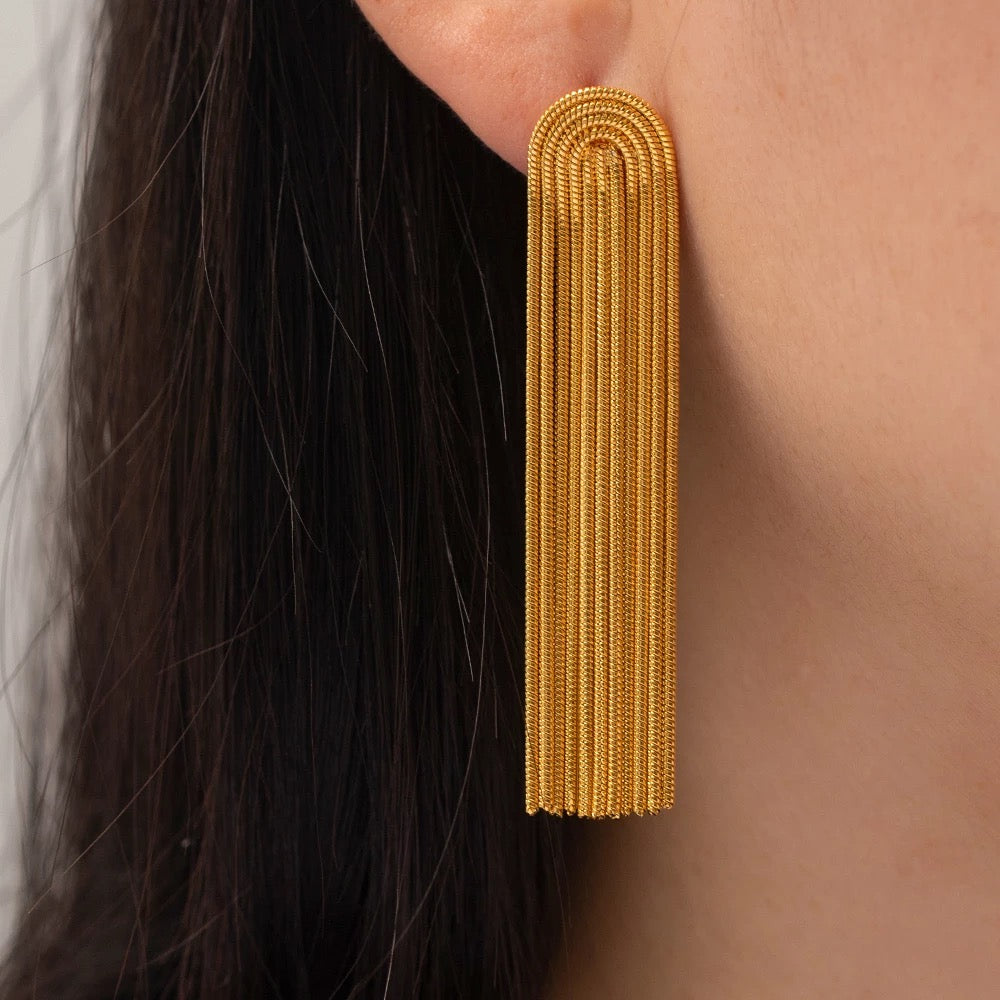 Addison Statement Earring featuring a 2.5-inch drop, 18K gold plating, and a stylish dangling design.