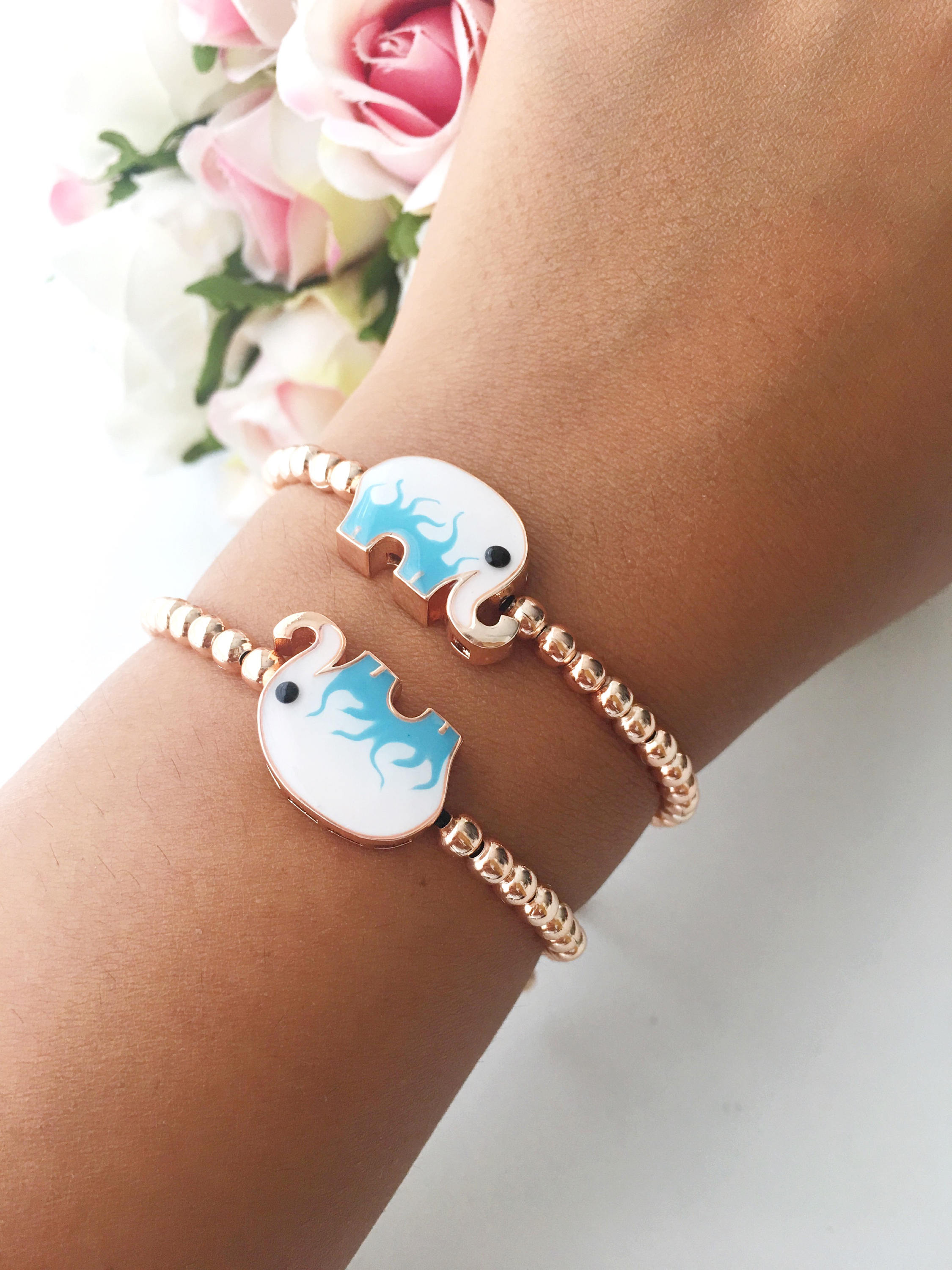 Adjustable Elephant Charm Bracelet featuring colorful elephant charms and rose gold beads, showcasing a stylish and meaningful design.