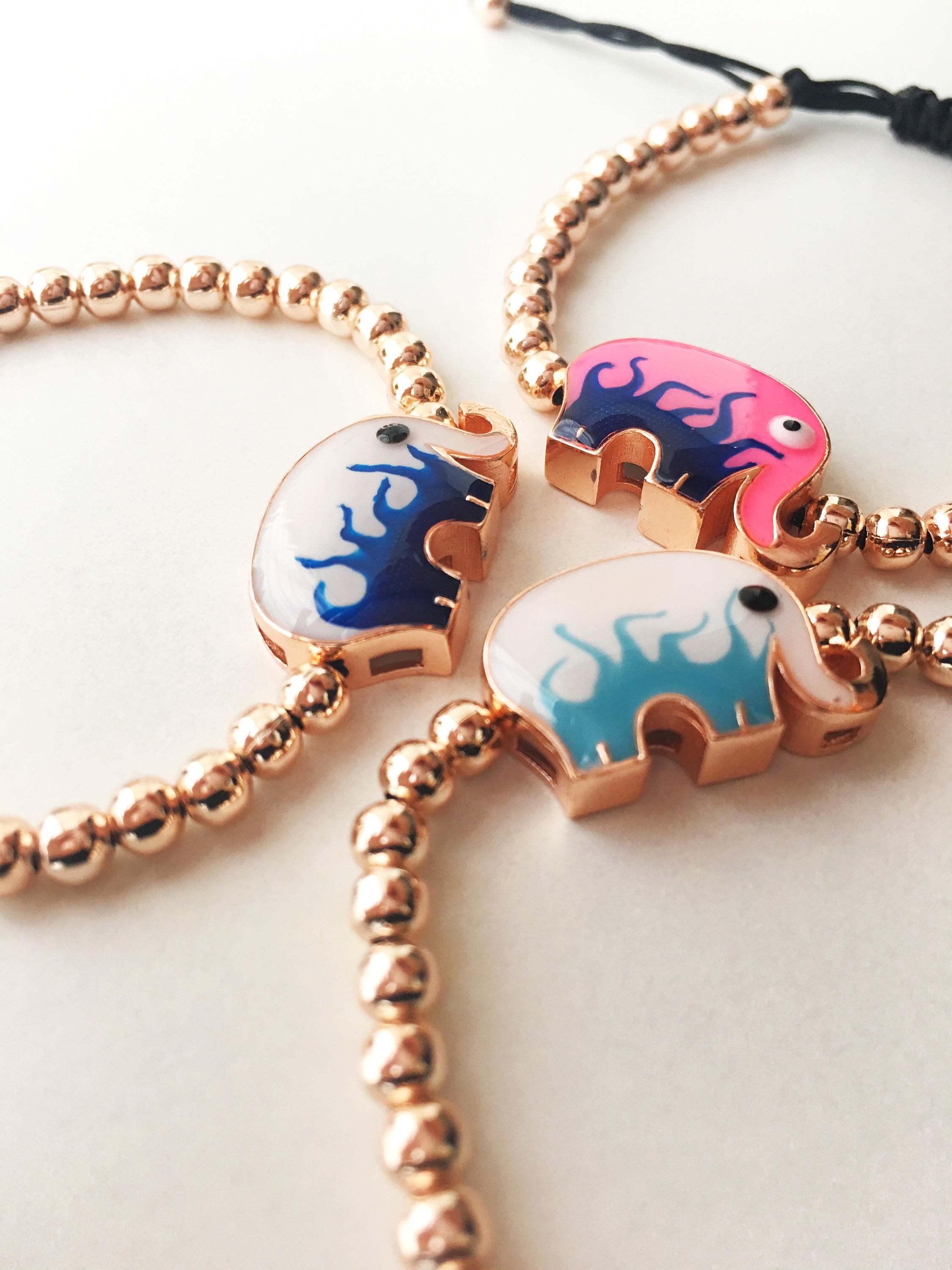 Adjustable Elephant Charm Bracelet featuring colorful elephant charms and rose gold beads, showcasing a stylish and meaningful design.