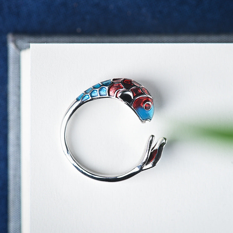 Adjustable Enamel Koi Bring Luck Open Ring featuring a vibrant koi fish design in colorful enamel on a copper base.