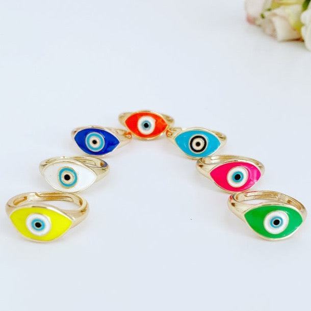 Adjustable Evil Eye Ring featuring a gold band and blue white evil eye bead, perfect for gifting and everyday wear.