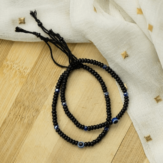 Adjustable Evil Eye Slim Black Beads Nazaria Bracelet for Kids featuring black beads and an evil eye charm, perfect for stylish protection.