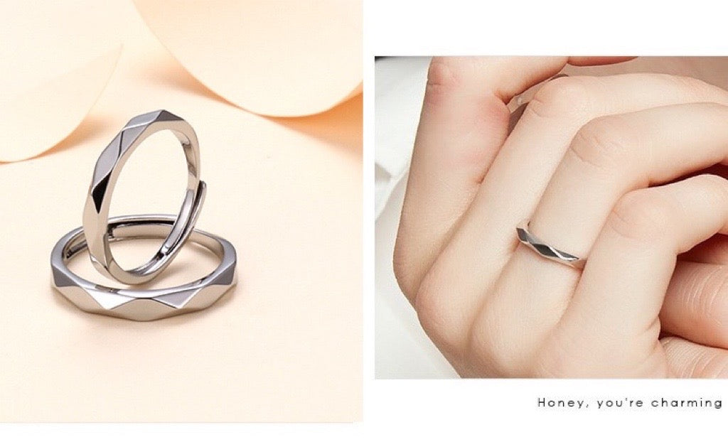 Adjustable couple open rings with hill edges design, crafted from alloy, showcasing a unique and meaningful symbol of love.