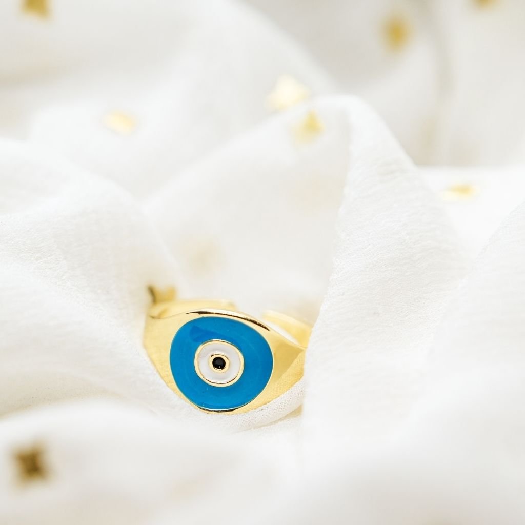 Adjustable Minimalist Devil Turkish Evil Eye Ring in blue and white, showcasing its boho style and protective charm.