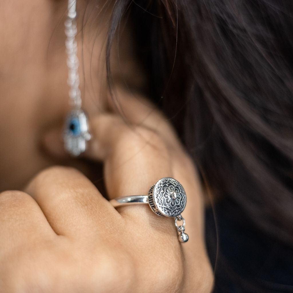 Adjustable Monk Buddhist Tibetan Spinner Mantra Prayer Ring made of sterling silver, featuring a minimalist design and a spinning feature for meditation.