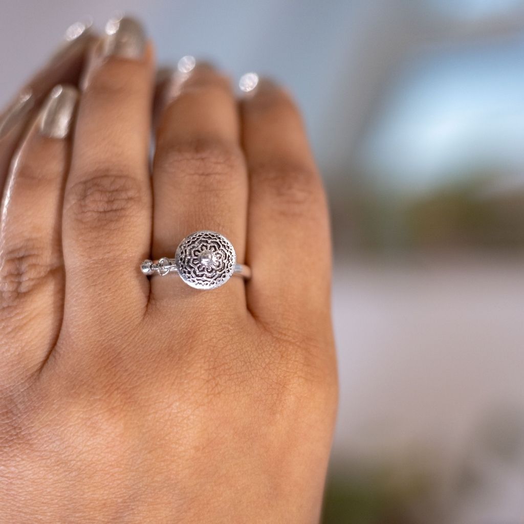 Adjustable Monk Buddhist Tibetan Spinner Mantra Prayer Ring made of sterling silver, featuring a minimalist design and a spinning feature for meditation.