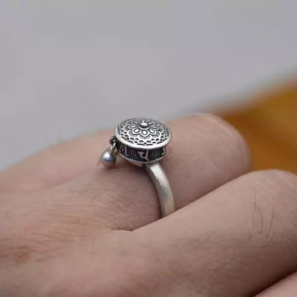 Adjustable Monk Buddhist Tibetan Spinner Mantra Prayer Ring made of sterling silver, featuring a minimalist design and a spinning feature for meditation.