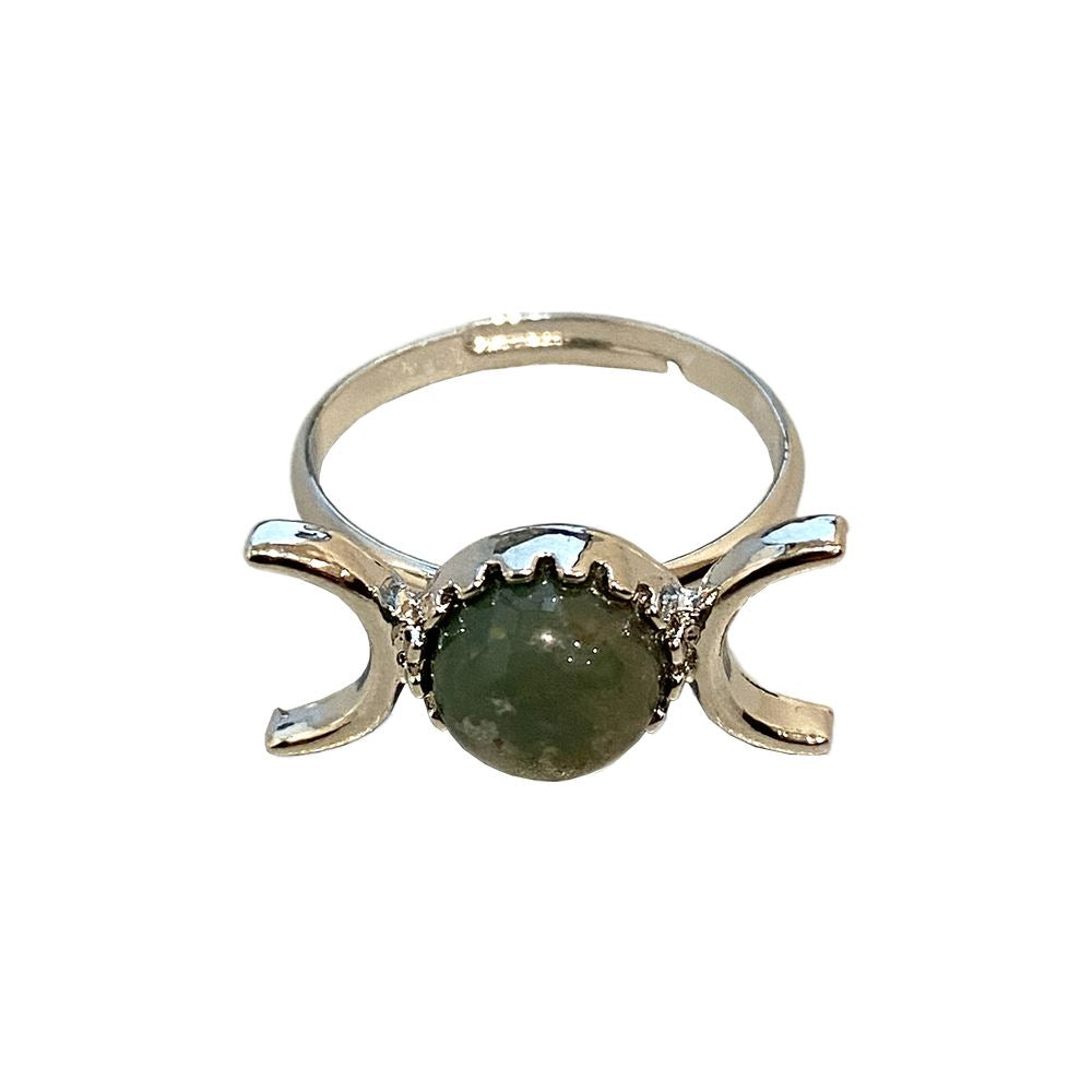 Adjustable ring featuring a 0.5cm gemstone, showcasing its unique design and craftsmanship.