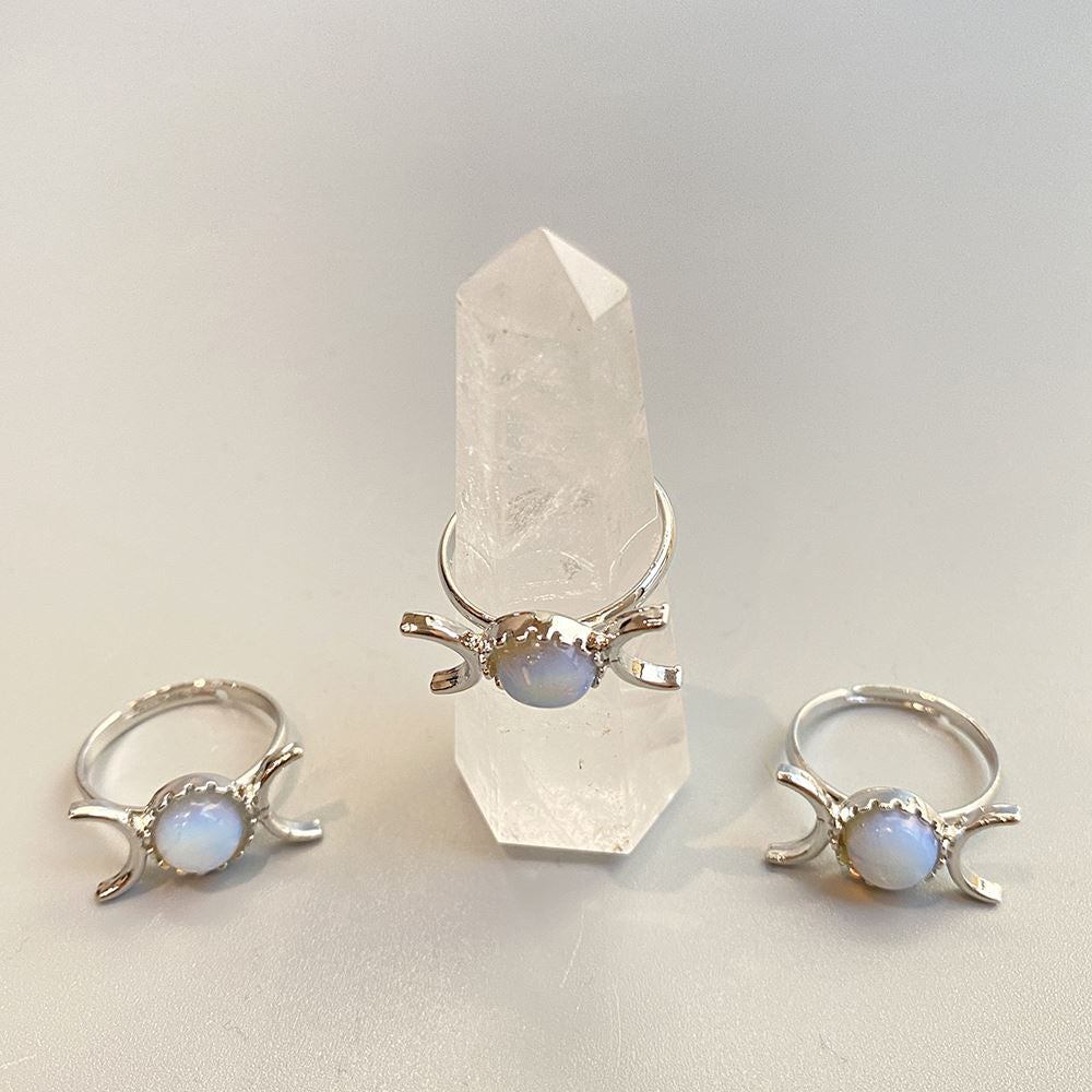 Adjustable ring featuring a 0.5cm gemstone, showcasing its unique design and craftsmanship.