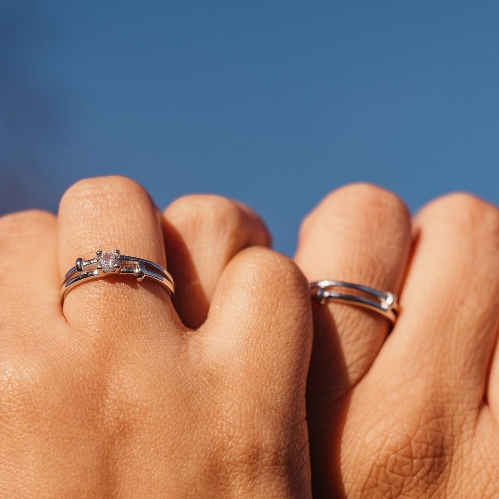 Adjustable Silver his and hers Zircon Promise Ring set featuring a sparkling Zircon stone and elegant silver plating, symbolizing love and commitment.