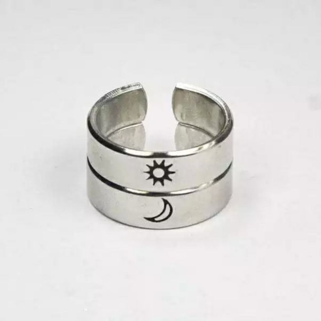 Adjustable silver plated couple promise ring set featuring moon and sun design, symbolizing love and commitment.