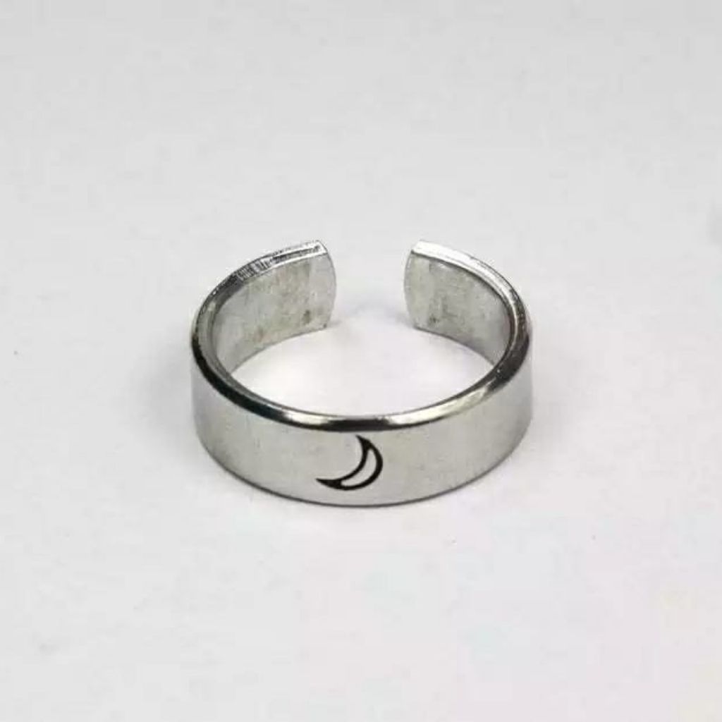 Adjustable silver plated couple promise ring set featuring moon and sun design, symbolizing love and commitment.