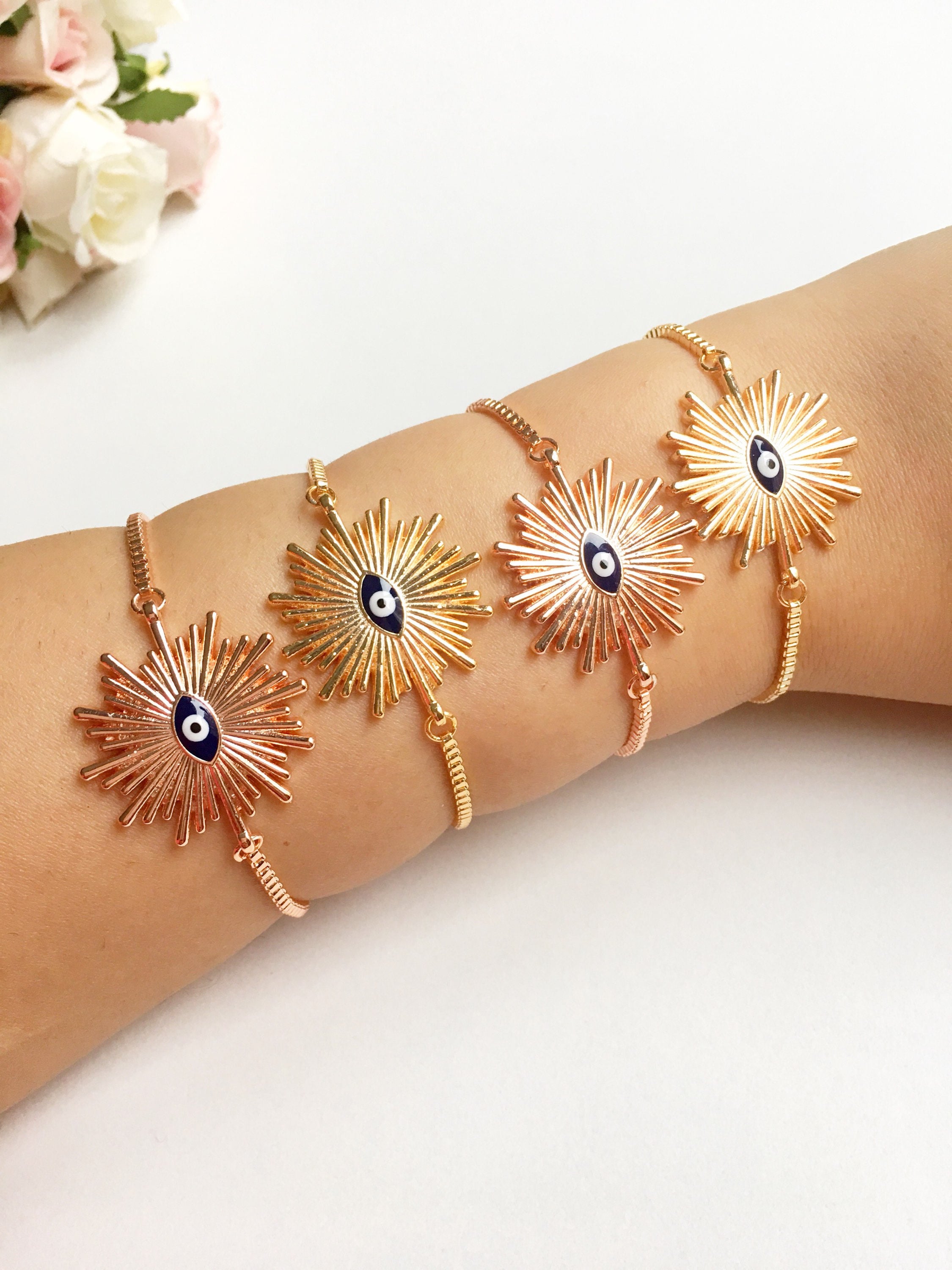 Adjustable Sunny Evil Eye Charm Bracelet in rose gold featuring a unique evil eye charm and a delicate chain, perfect for protection and style.