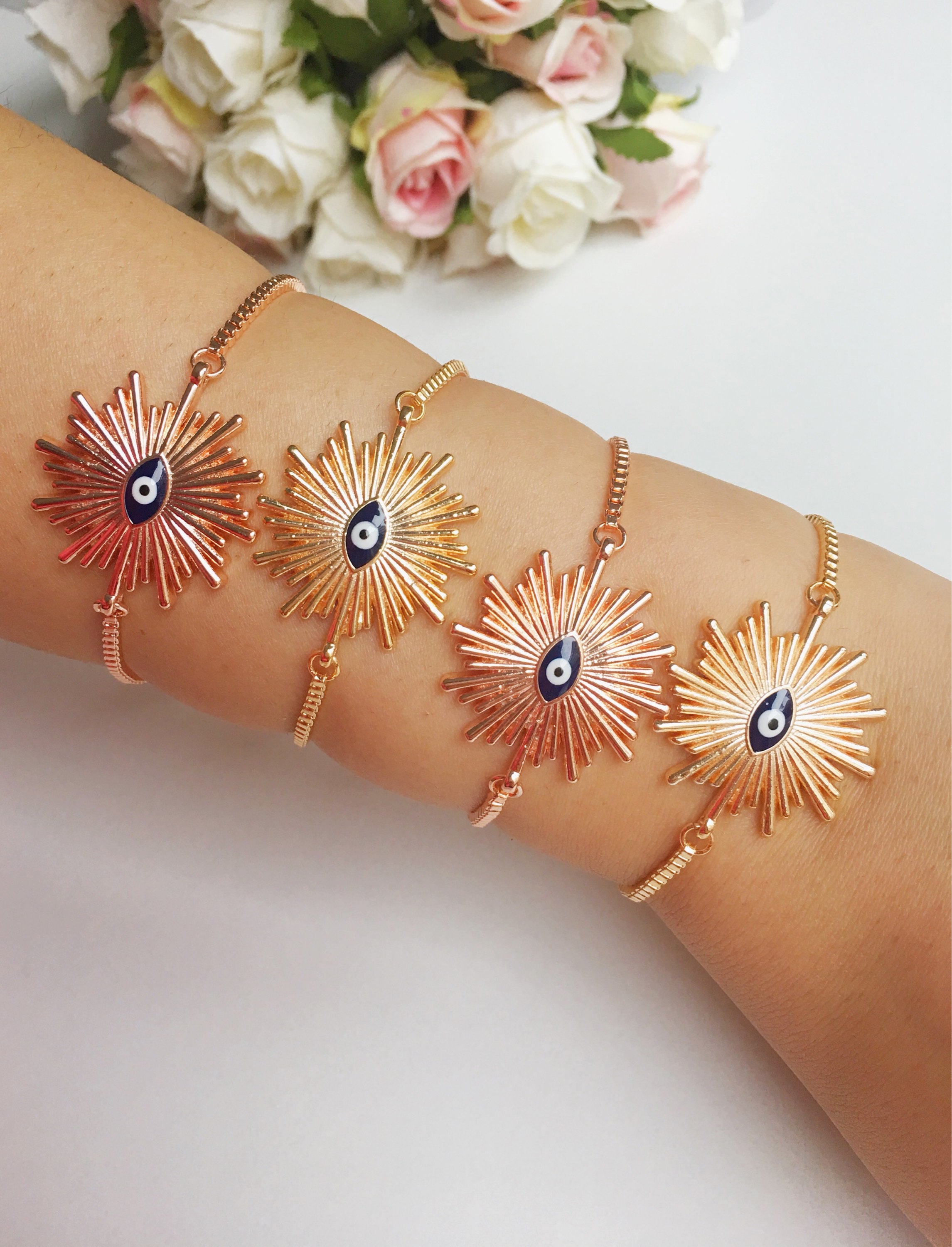 Adjustable Sunny Evil Eye Charm Bracelet in rose gold featuring a unique evil eye charm and a delicate chain, perfect for protection and style.