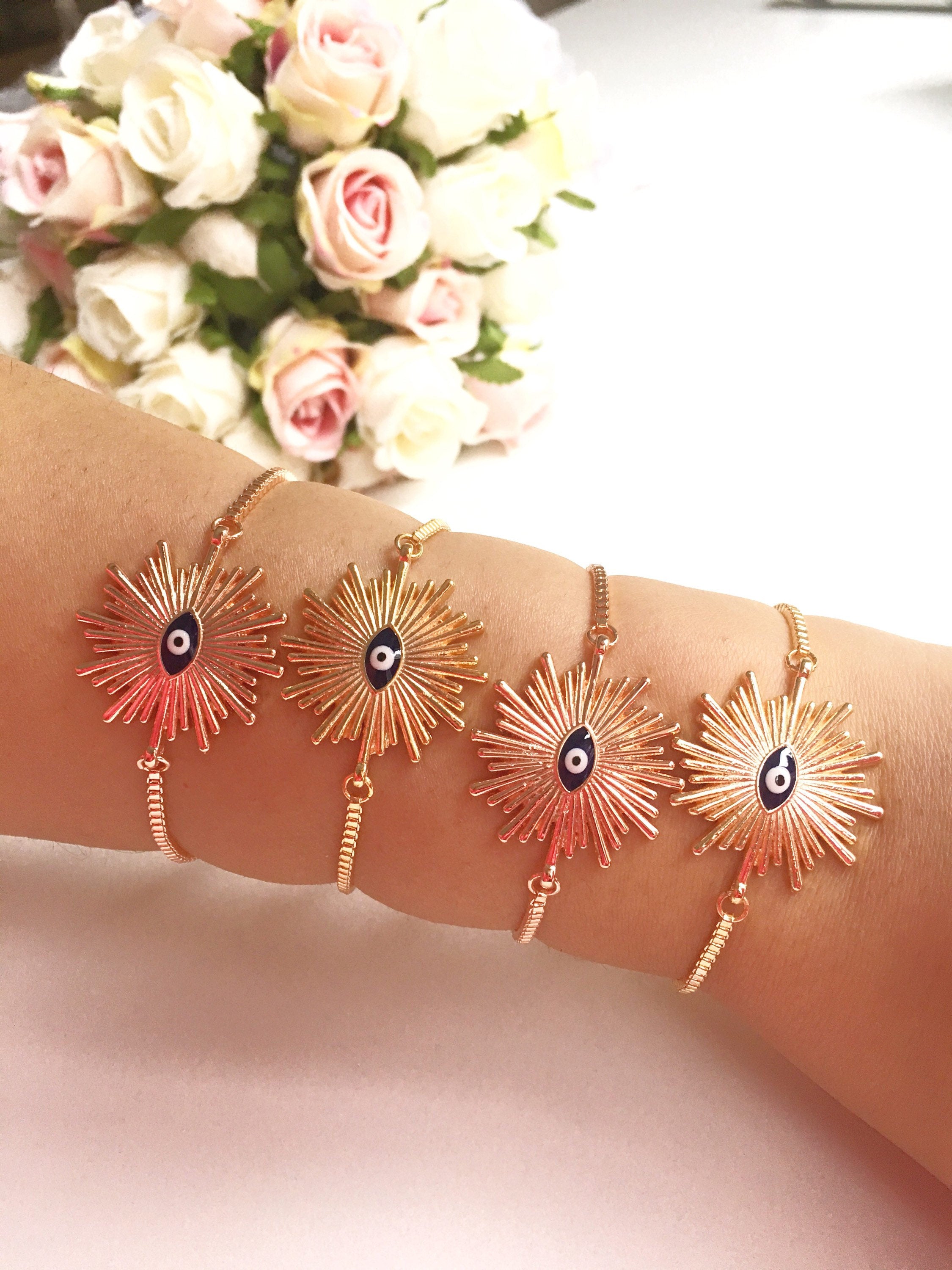 Adjustable Sunny Evil Eye Charm Bracelet in rose gold featuring a unique evil eye charm and a delicate chain, perfect for protection and style.