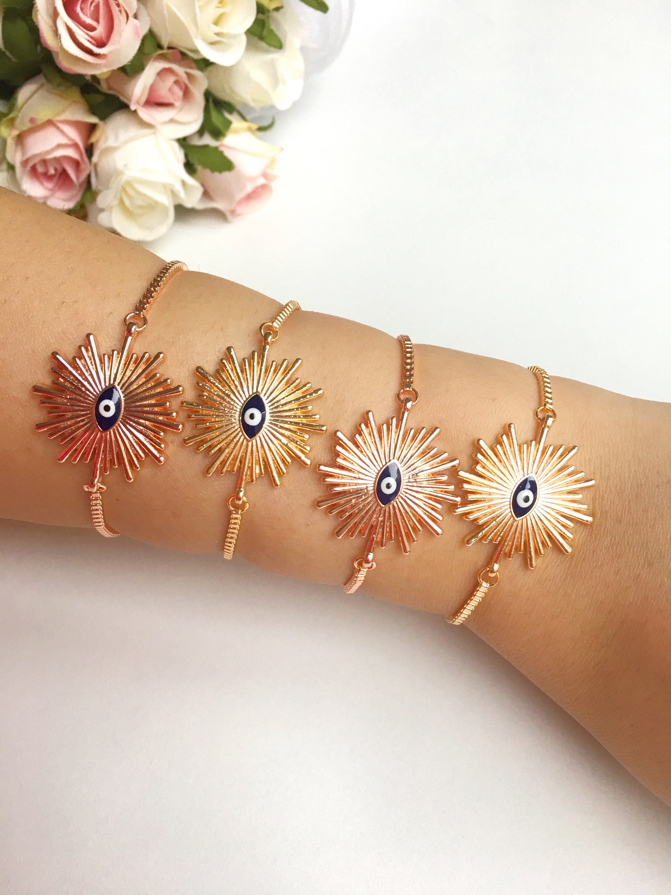 Adjustable Sunny Evil Eye Charm Bracelet in rose gold featuring a unique evil eye charm and a delicate chain, perfect for protection and style.