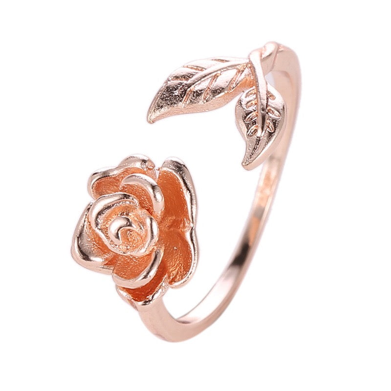 Adjustable vintage rose open ring made of copper with rhinestone embellishments, showcasing a delicate rose design.