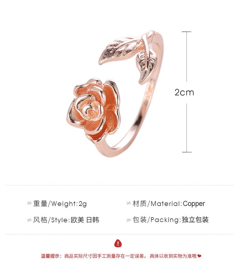 Adjustable vintage rose open ring made of copper with rhinestone embellishments, showcasing a delicate rose design.