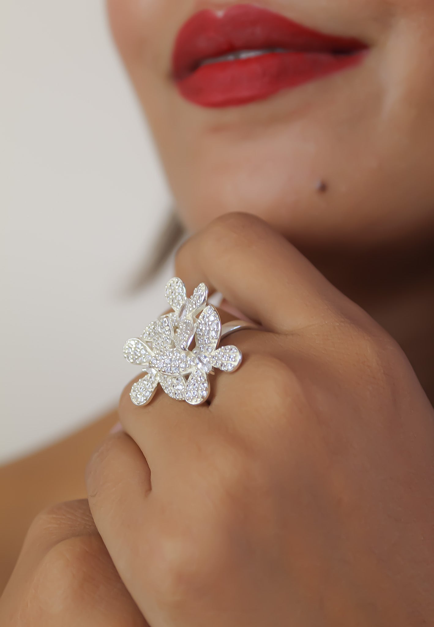 Elegant African Butterfly Ring in 18K gold or silver plating, adorned with sparkling zirconia stones, showcasing a butterfly-inspired design.