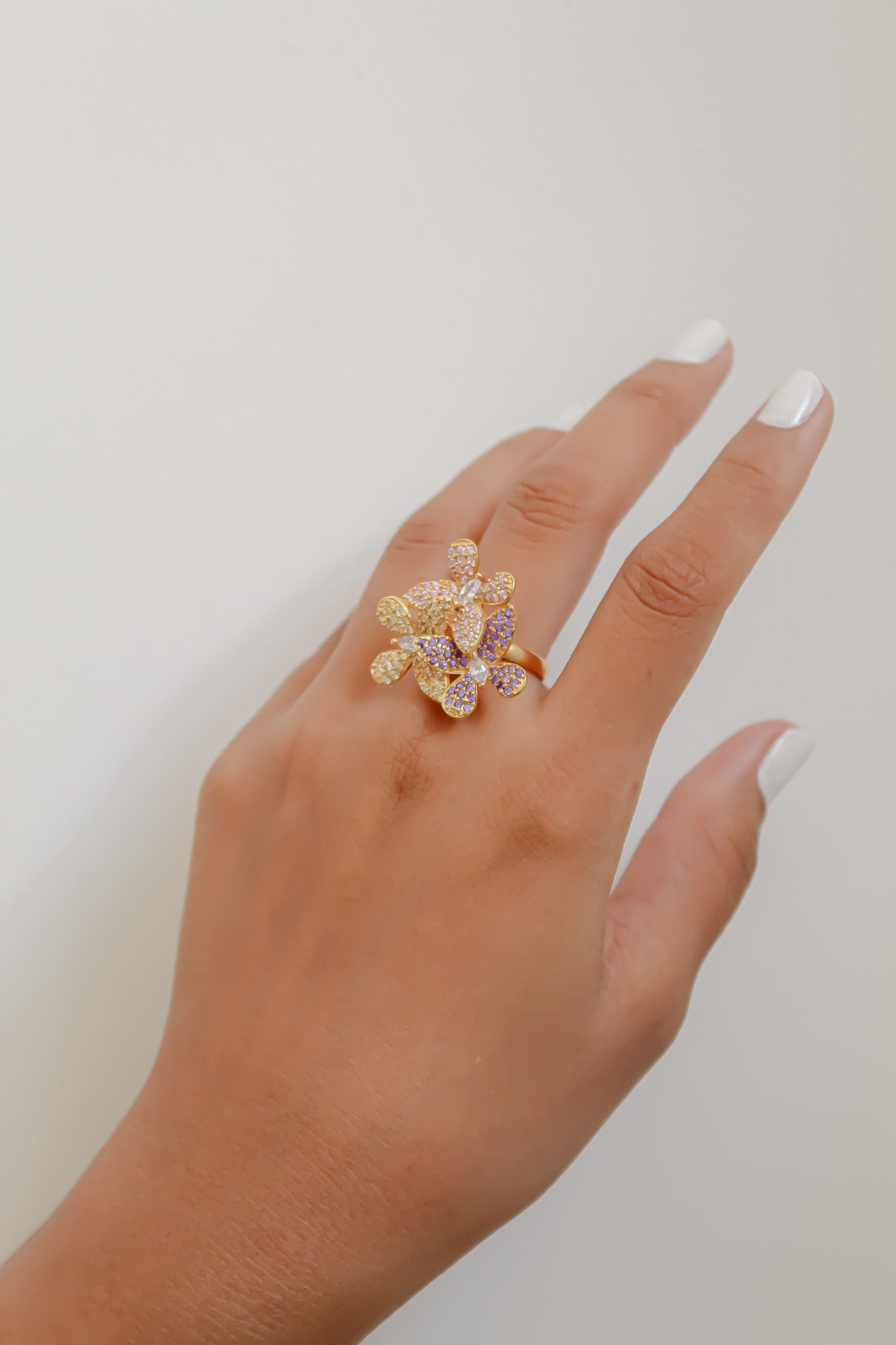 Elegant African Butterfly Ring in 18K gold or silver plating, adorned with sparkling zirconia stones, showcasing a butterfly-inspired design.