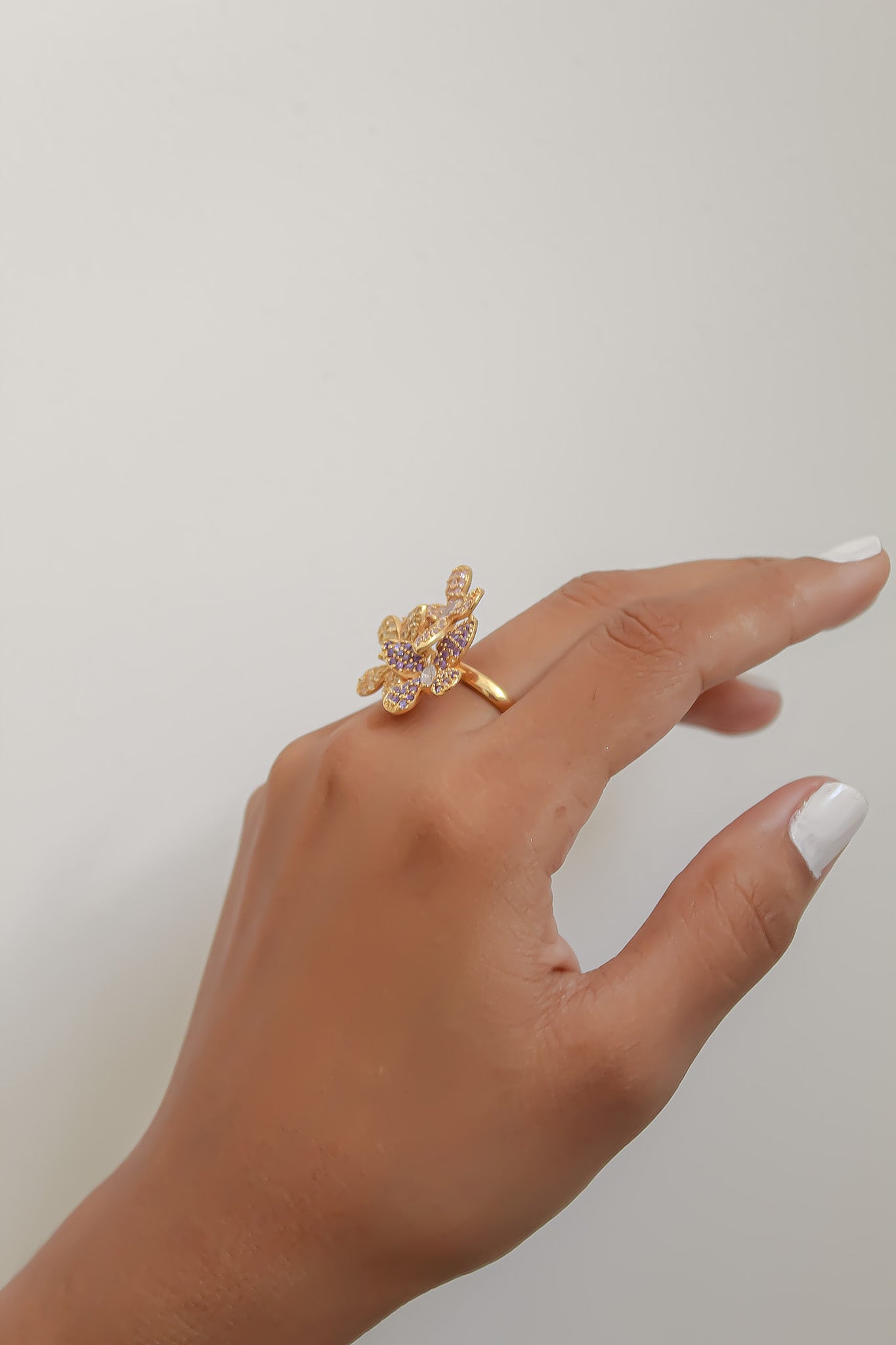 Elegant African Butterfly Ring in 18K gold or silver plating, adorned with sparkling zirconia stones, showcasing a butterfly-inspired design.