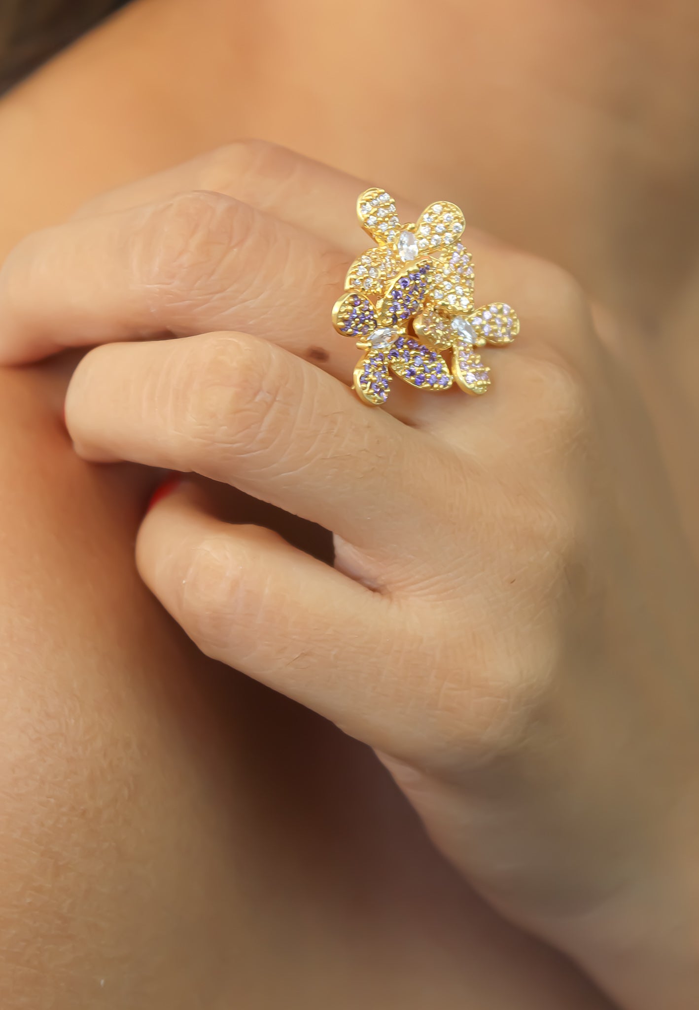 Elegant African Butterfly Ring in 18K gold or silver plating, adorned with sparkling zirconia stones, showcasing a butterfly-inspired design.