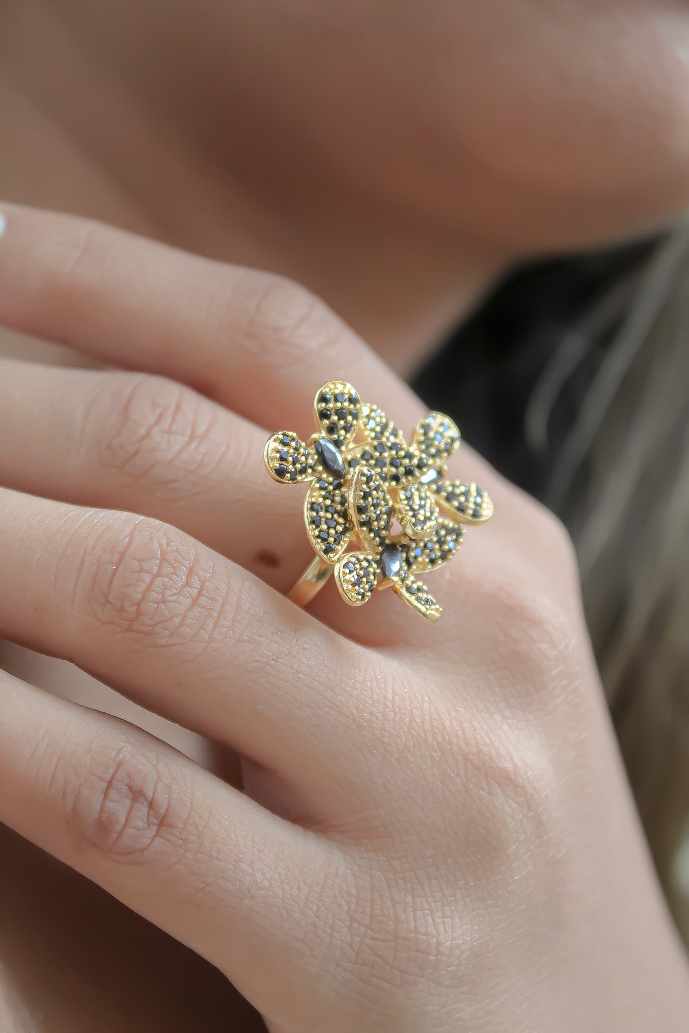 Elegant African Butterfly Ring in 18K gold or silver plating, adorned with sparkling zirconia stones, showcasing a butterfly-inspired design.