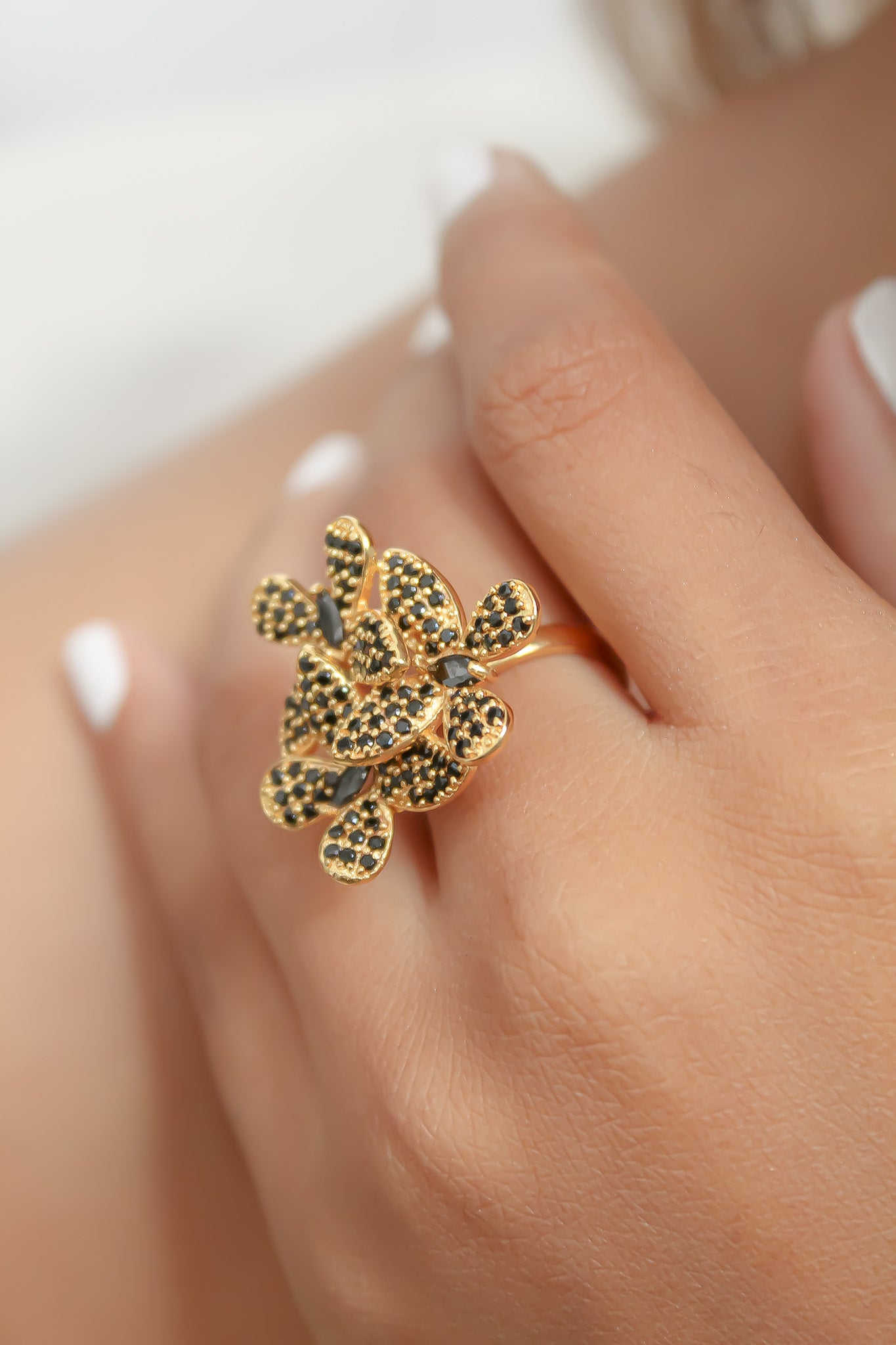 Elegant African Butterfly Ring in 18K gold or silver plating, adorned with sparkling zirconia stones, showcasing a butterfly-inspired design.