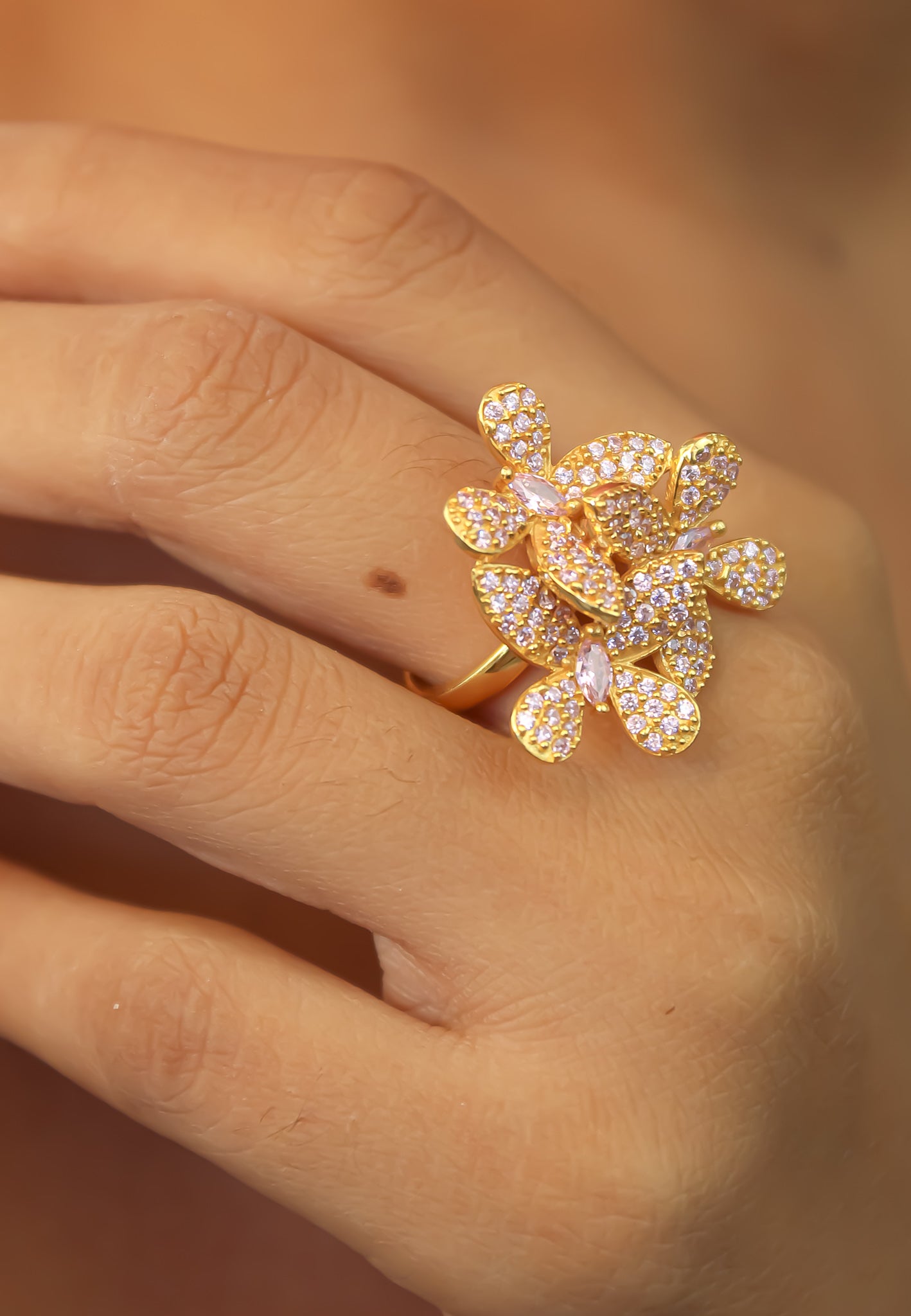 Elegant African Butterfly Ring in 18K gold or silver plating, adorned with sparkling zirconia stones, showcasing a butterfly-inspired design.