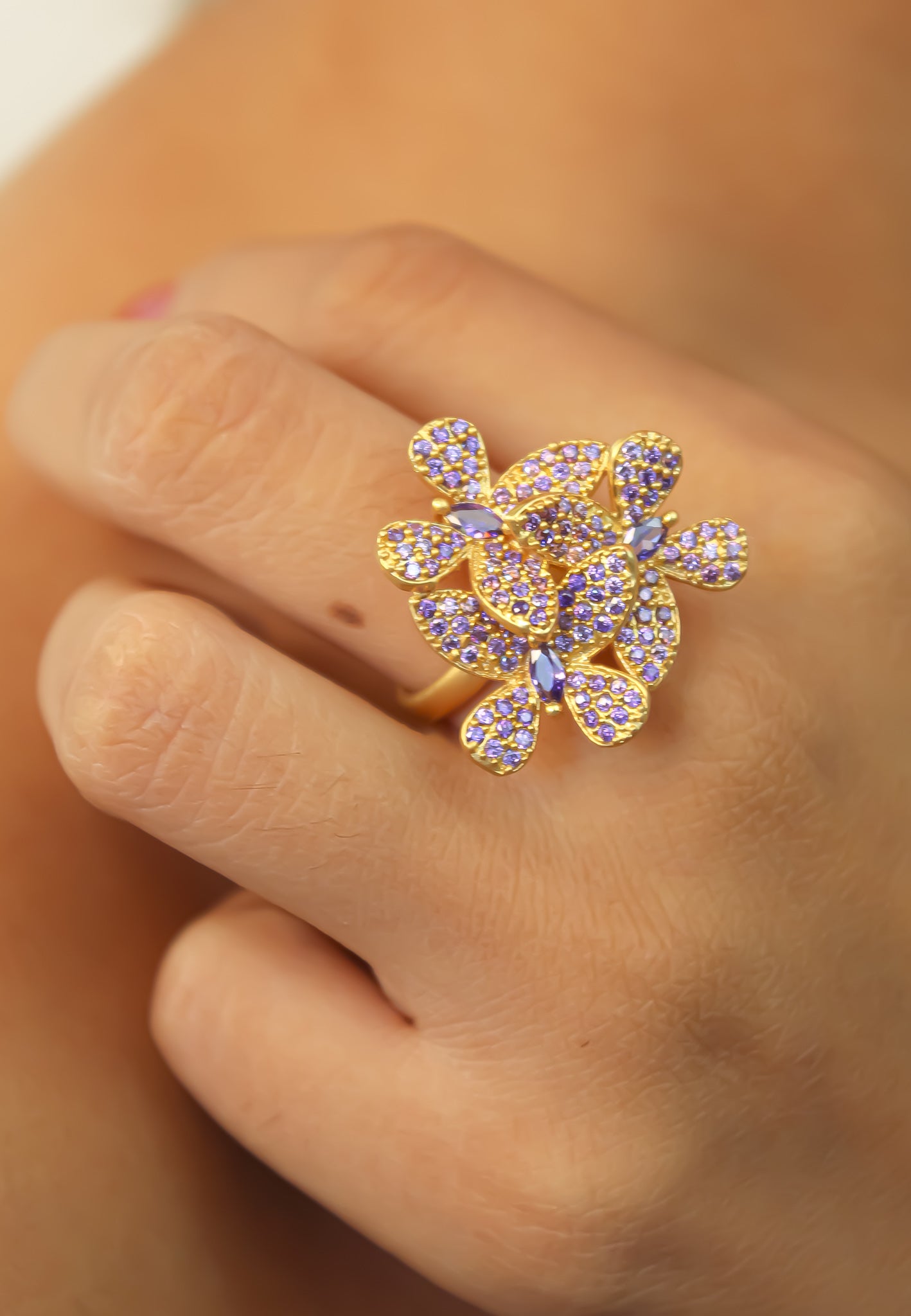 Elegant African Butterfly Ring in 18K gold or silver plating, adorned with sparkling zirconia stones, showcasing a butterfly-inspired design.