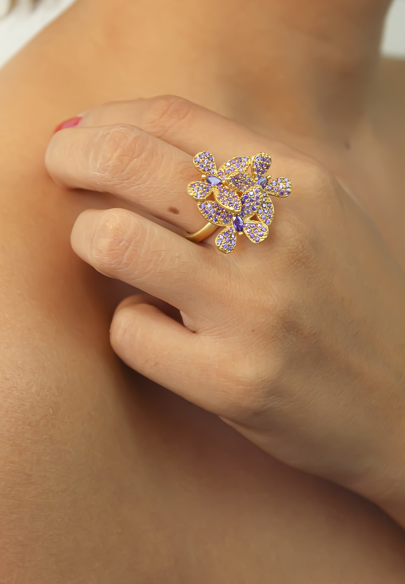 Elegant African Butterfly Ring in 18K gold or silver plating, adorned with sparkling zirconia stones, showcasing a butterfly-inspired design.