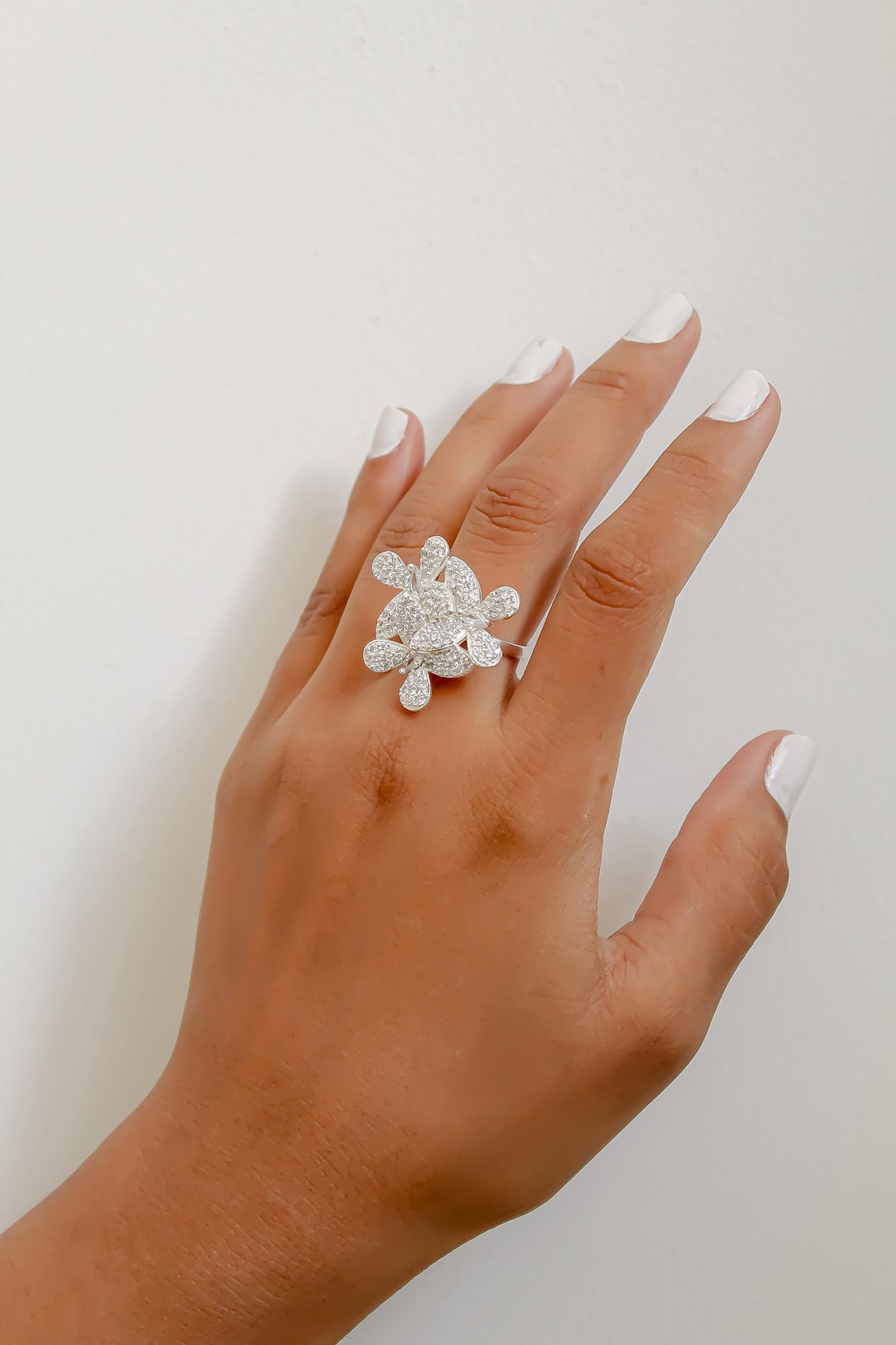 Elegant African Butterfly Ring in 18K gold or silver plating, adorned with sparkling zirconia stones, showcasing a butterfly-inspired design.