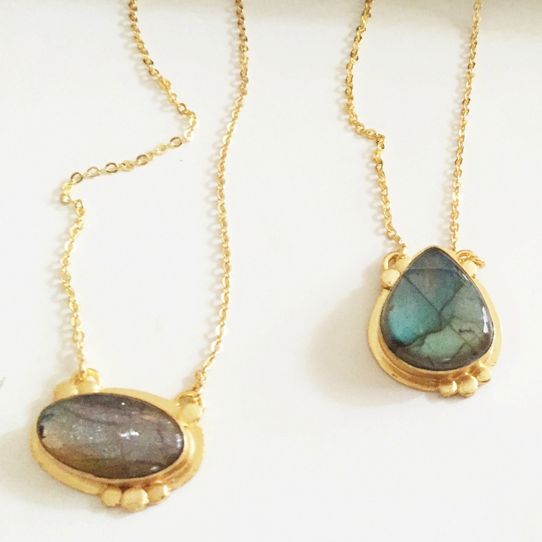 Agadir Labradorite Pendant featuring unique iridescent stone on an 18K gold plated chain.