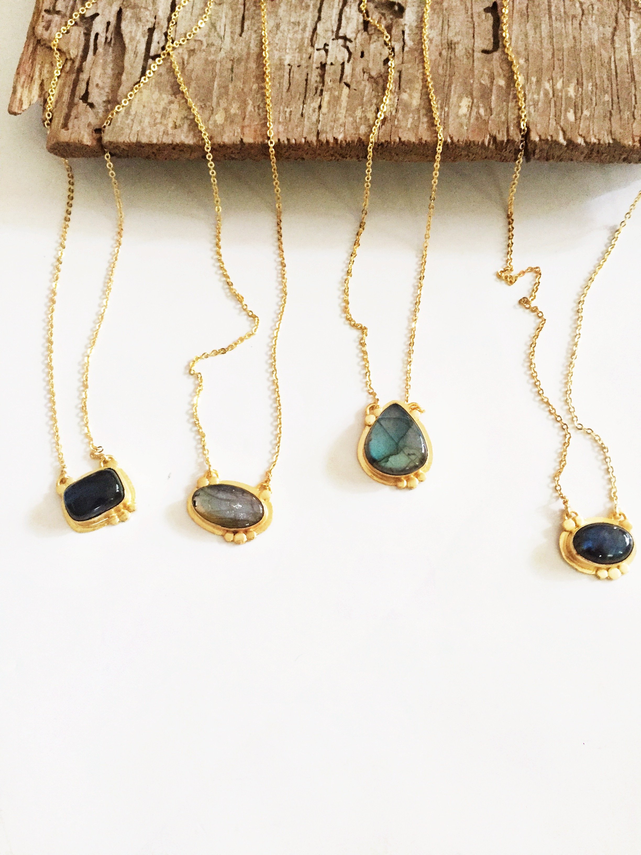 Agadir Labradorite Pendant featuring unique iridescent stone on an 18K gold plated chain.