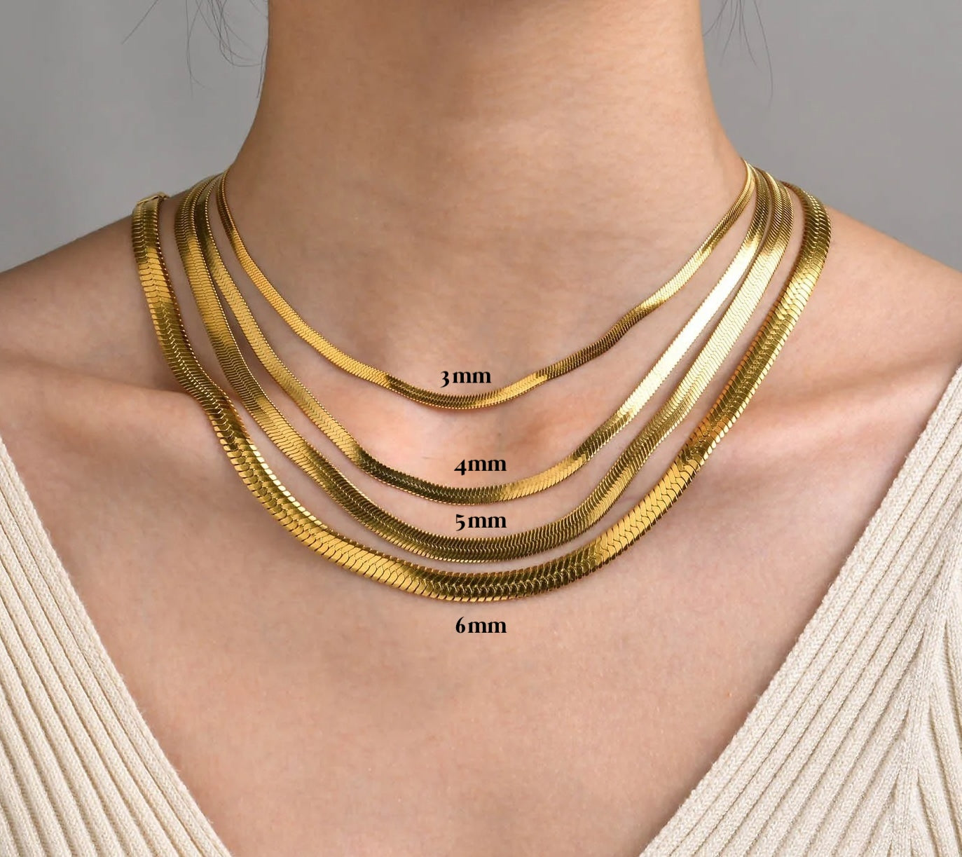 Agapi 4mm Snake Necklace Chain in rich gold, showcasing its elegant design and adjustable length.