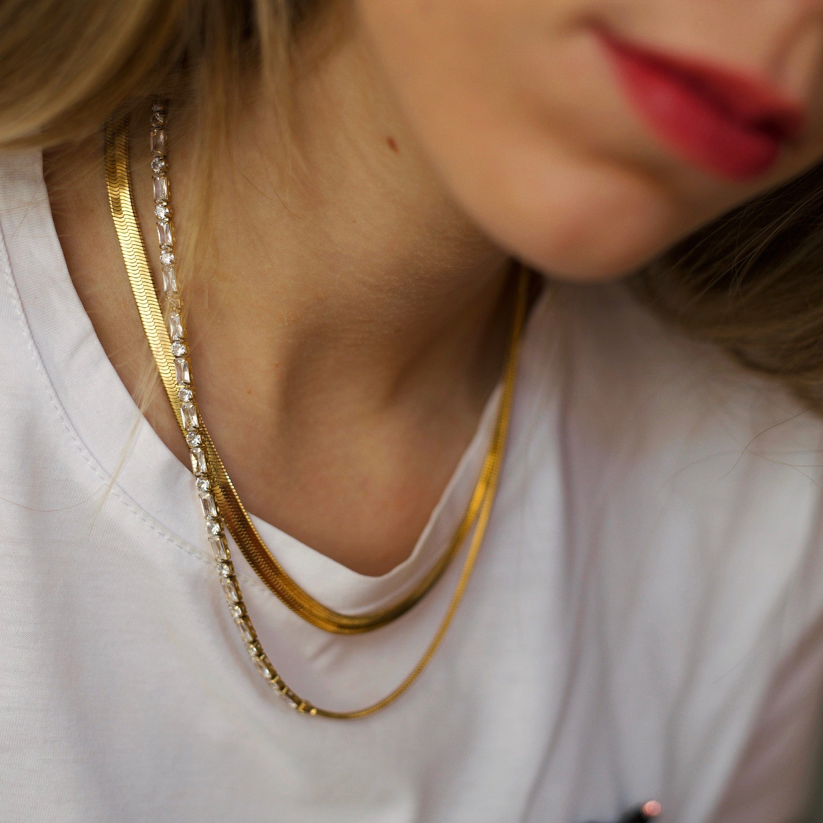 Agapi 5mm Snake Necklace Choker in rich gold, showcasing its elegant design and adjustable length.