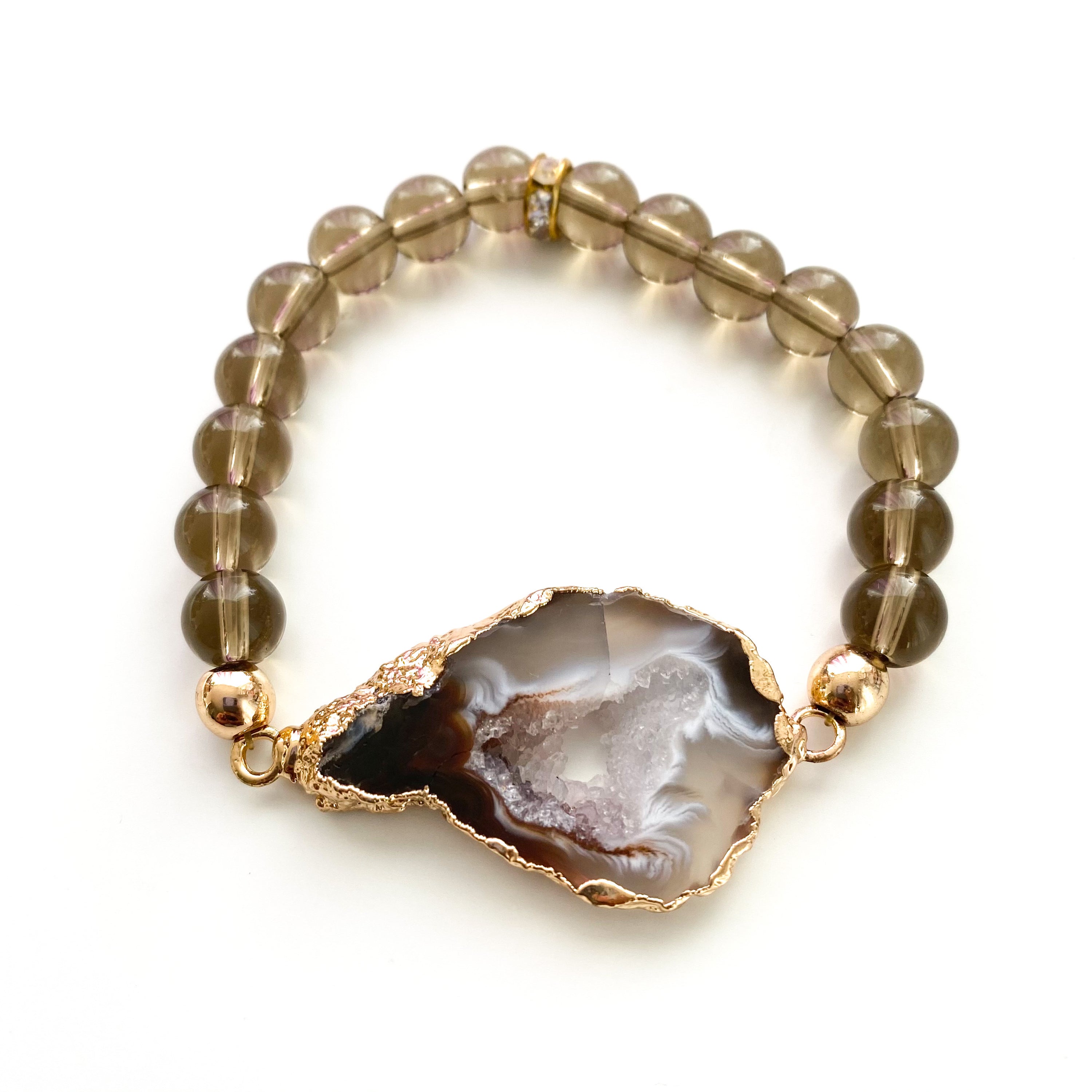 Agate Geode Beaded Bracelet featuring unique agate slices, black onyx, smoky quartz beads, and rhinestone spacers.