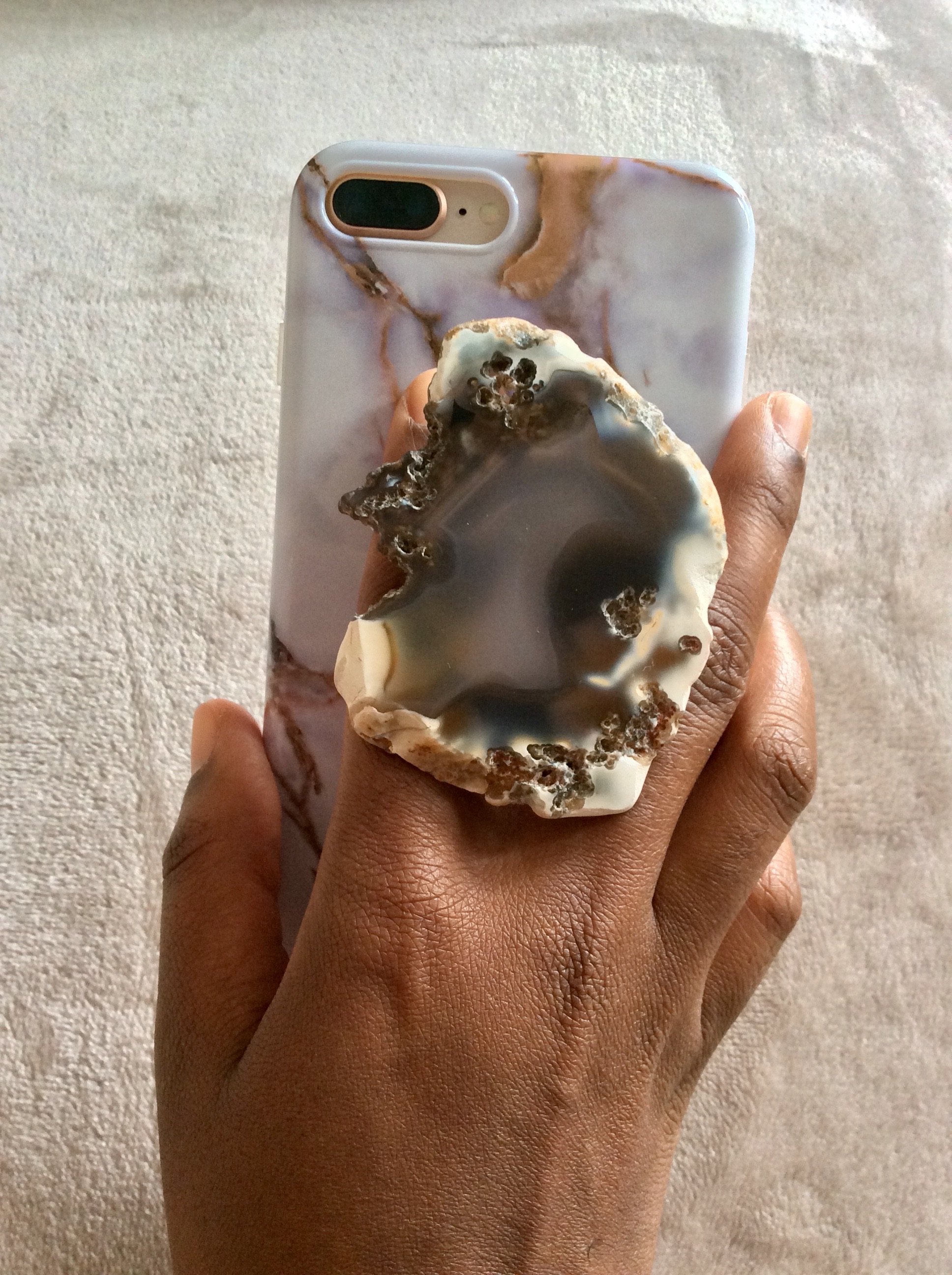 Handmade Brazilian Agate Phone Grip featuring unique patterns and colors, enhancing smartphone aesthetics.