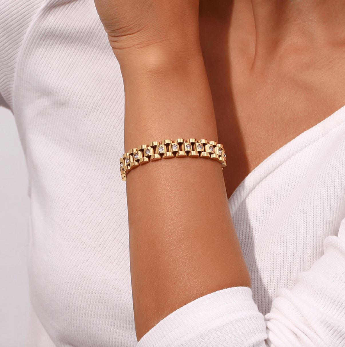 Ahern Statement Chain Bracelet Gold featuring a chunky Panther watch chain design, showcasing its thick 18K gold plating and durable stainless steel material.