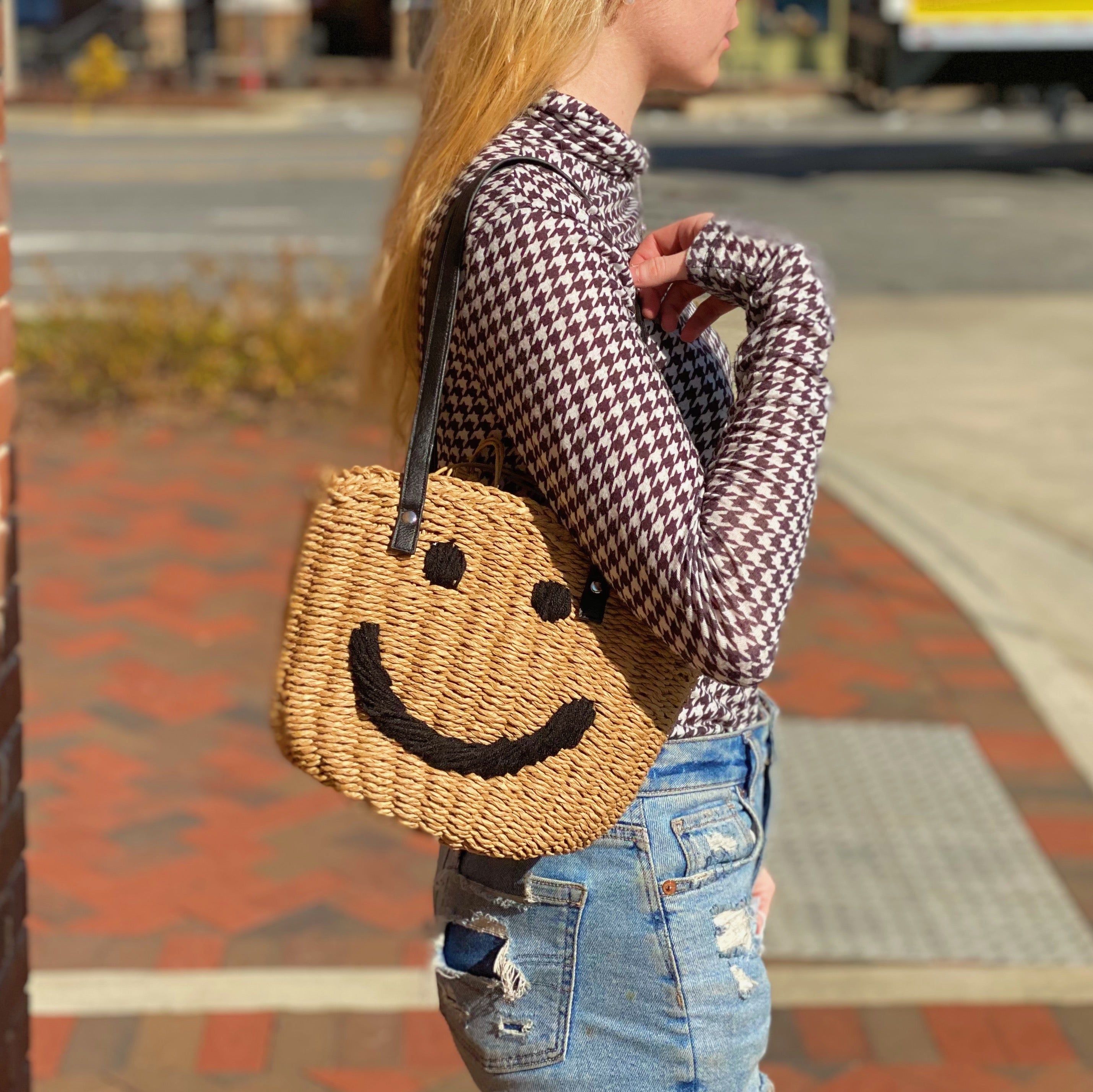 All Happy Vibes Bucket Bag featuring a cheerful woven design, cinch closure, and faux leather strap, perfect for summer outings.