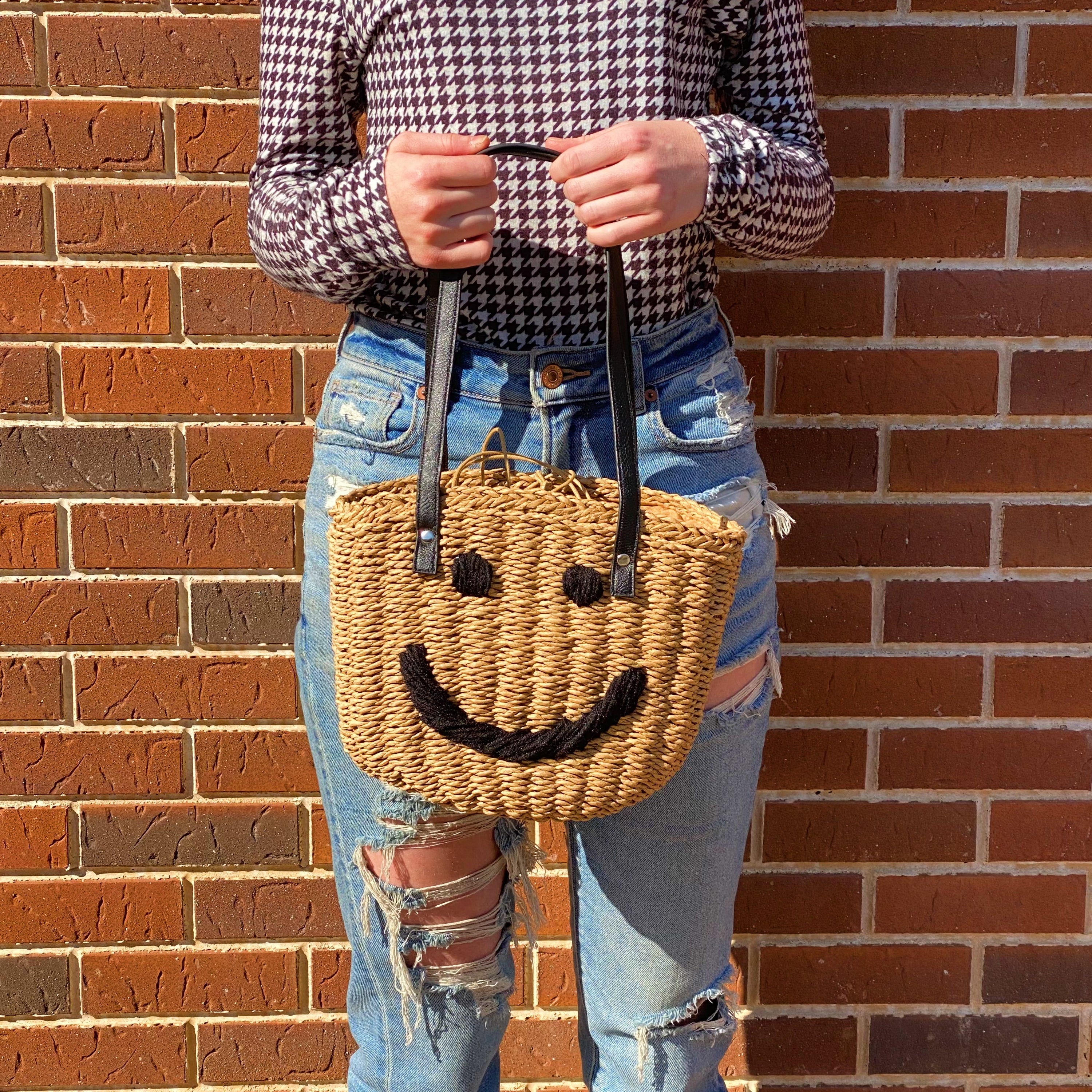 All Happy Vibes Bucket Bag featuring a cheerful woven design, cinch closure, and faux leather strap, perfect for summer outings.