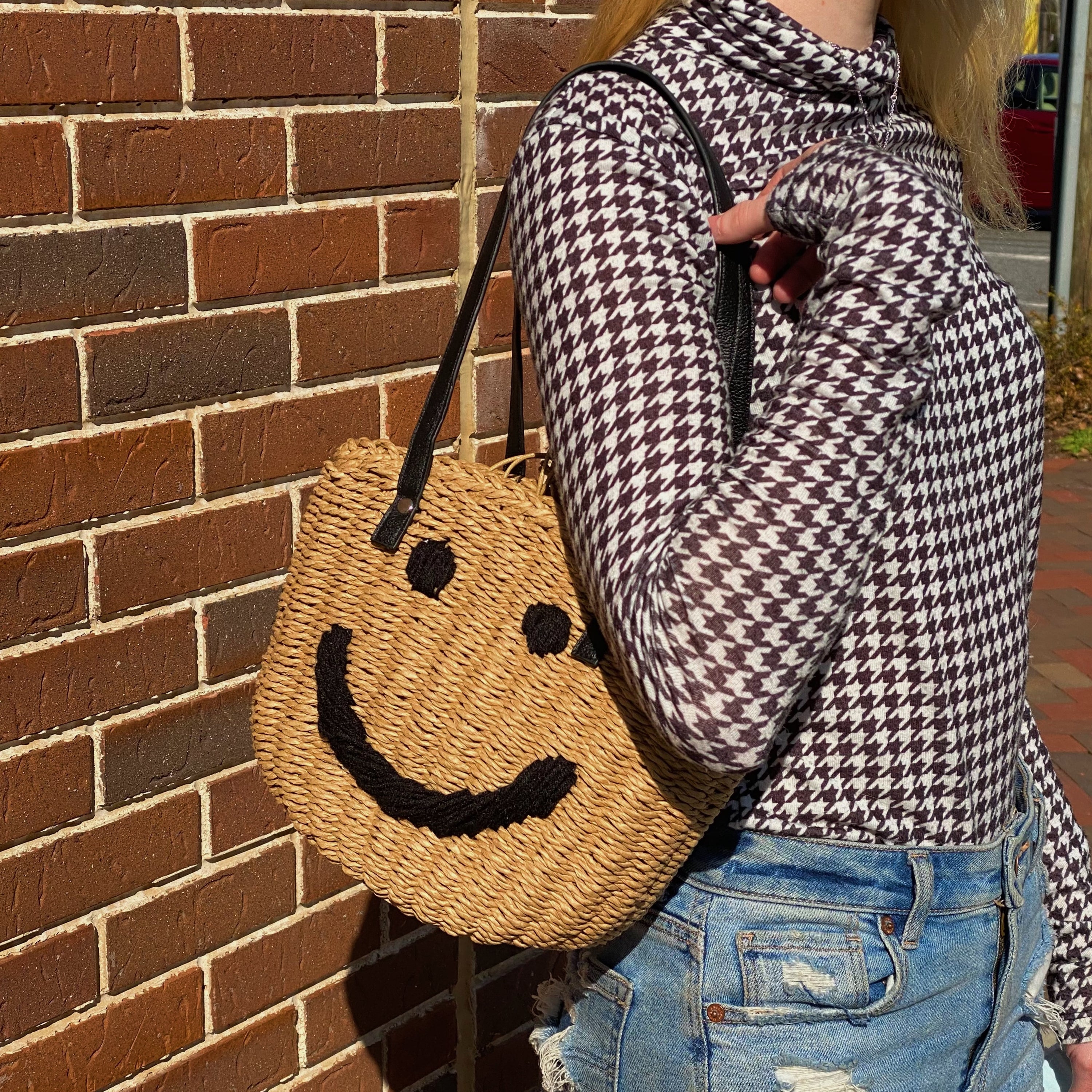 All Happy Vibes Bucket Bag featuring a cheerful woven design, cinch closure, and faux leather strap, perfect for summer outings.