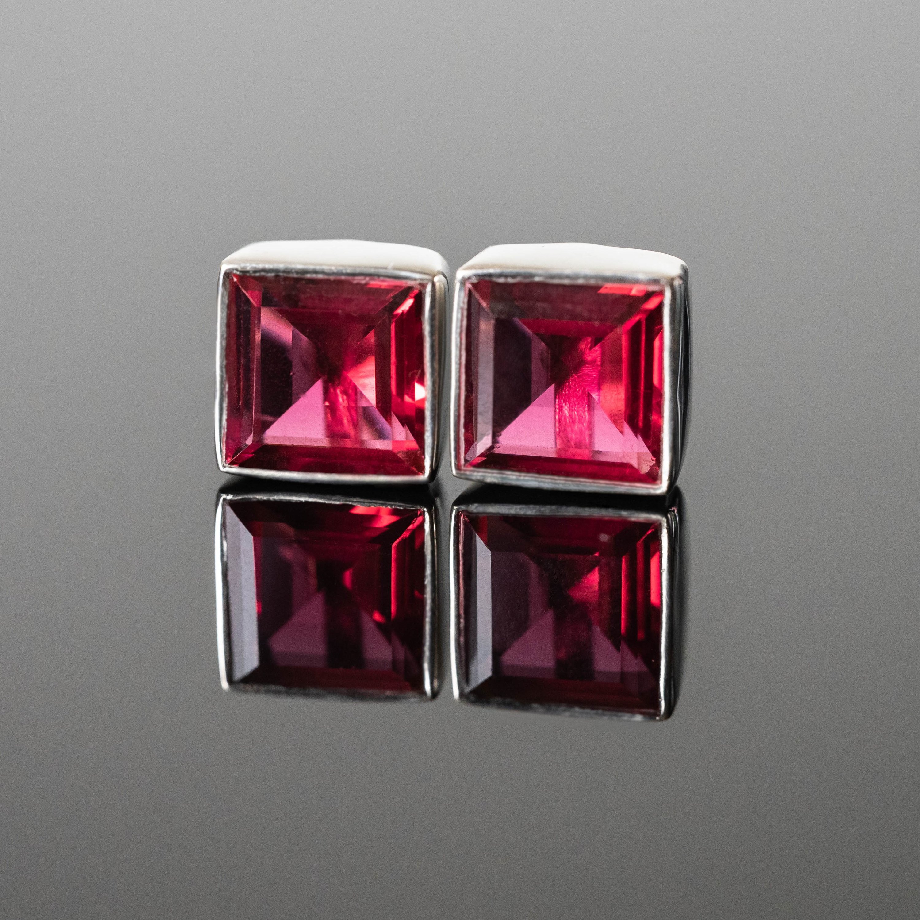 Elegant Alejandra Tourmaline Square Studs featuring red tourmaline stones set in 925 sterling silver with rhodium plating.